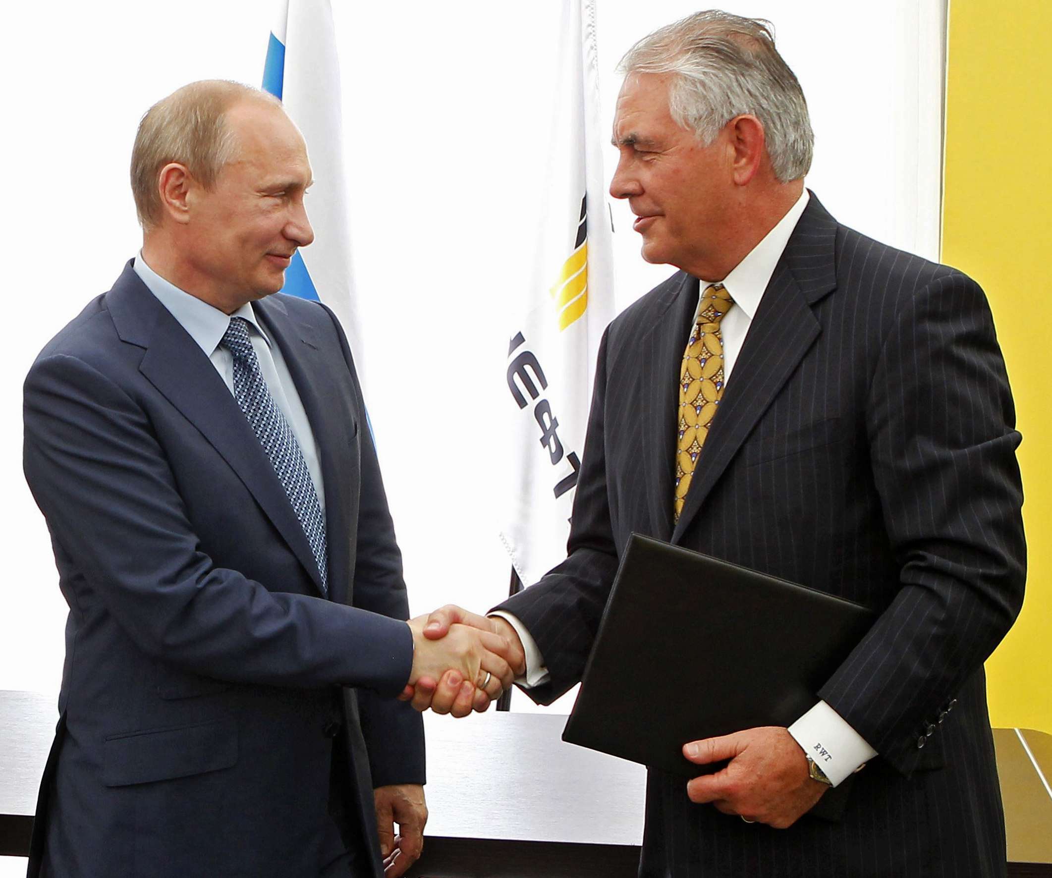 Russian President Vladimir Putin and Exxon Mobil CEO Rex Tillerson, now US secretary of state-designate, at the signing ceremony for an agreement with Russia’s Rosneft, at the Black Sea port of Tuapse, southern Russia, in 2012. Photo: AP