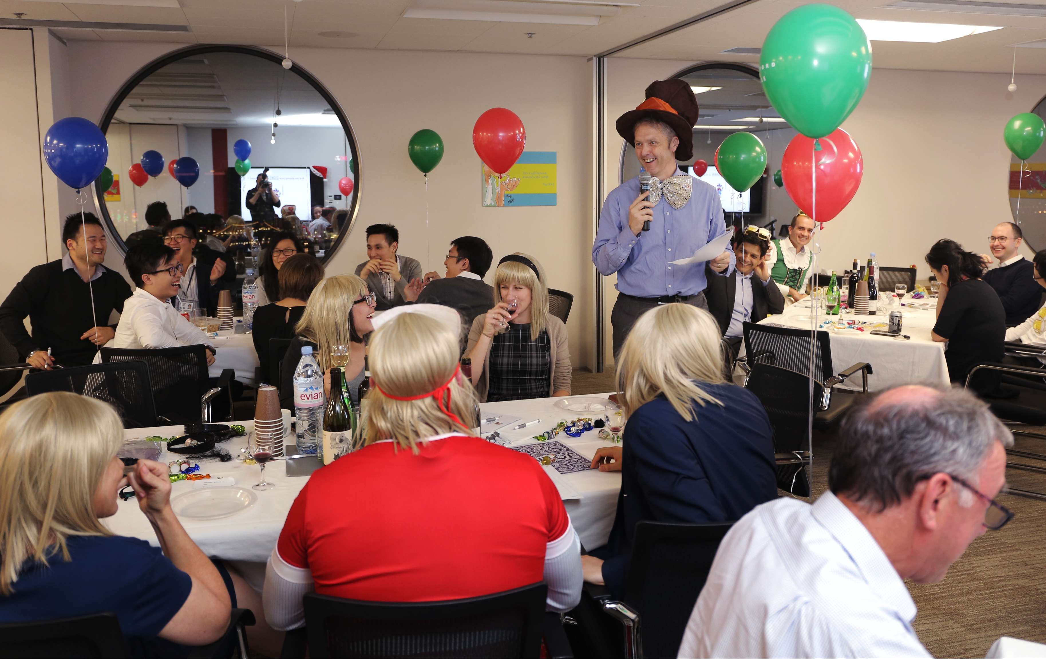 Clifford Chance employees try to come up with the answers in their annual quiz. Photo: Paul Yeung