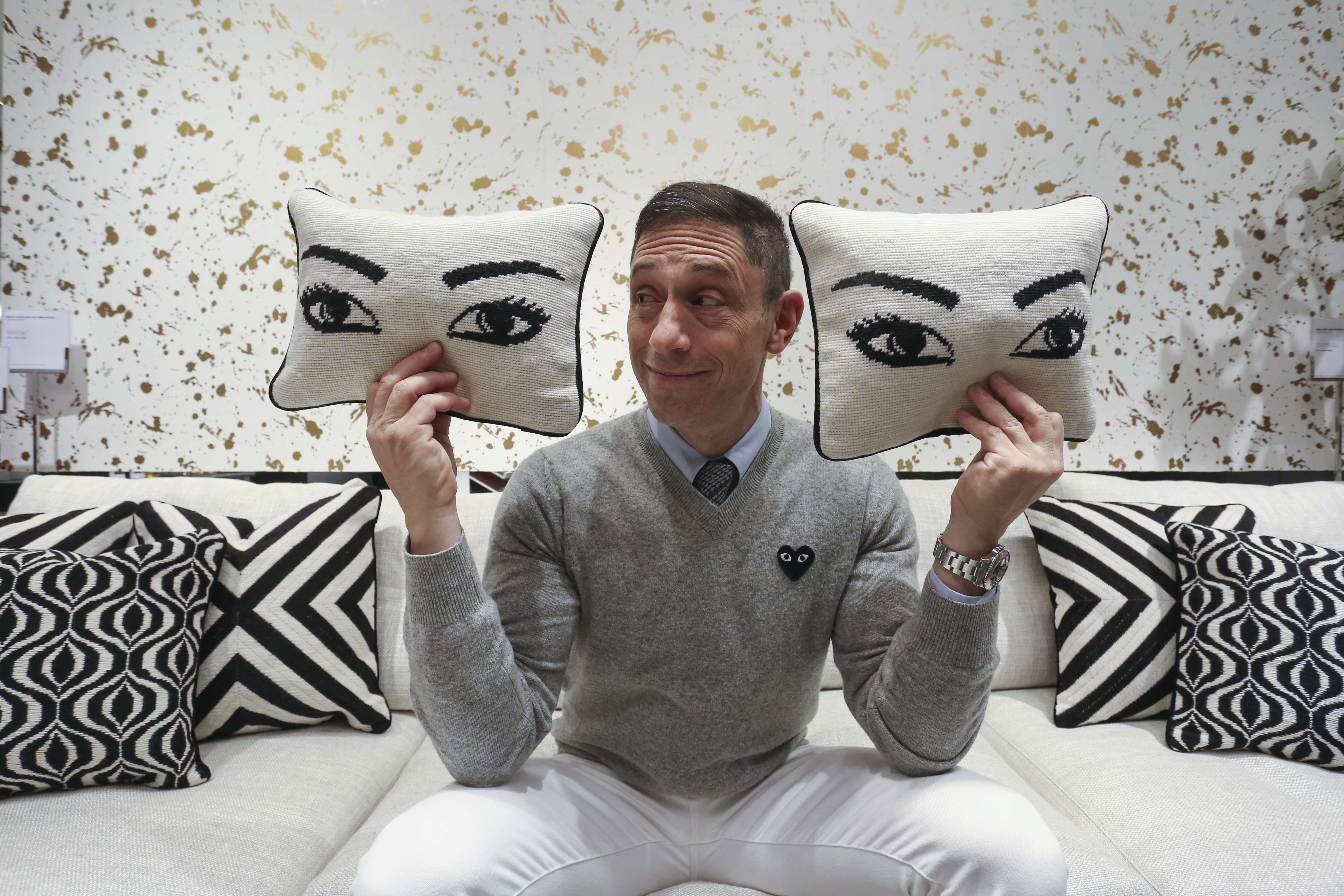 Jonathan Adler with Eye throw pillows. Picture: Jonathan Wong