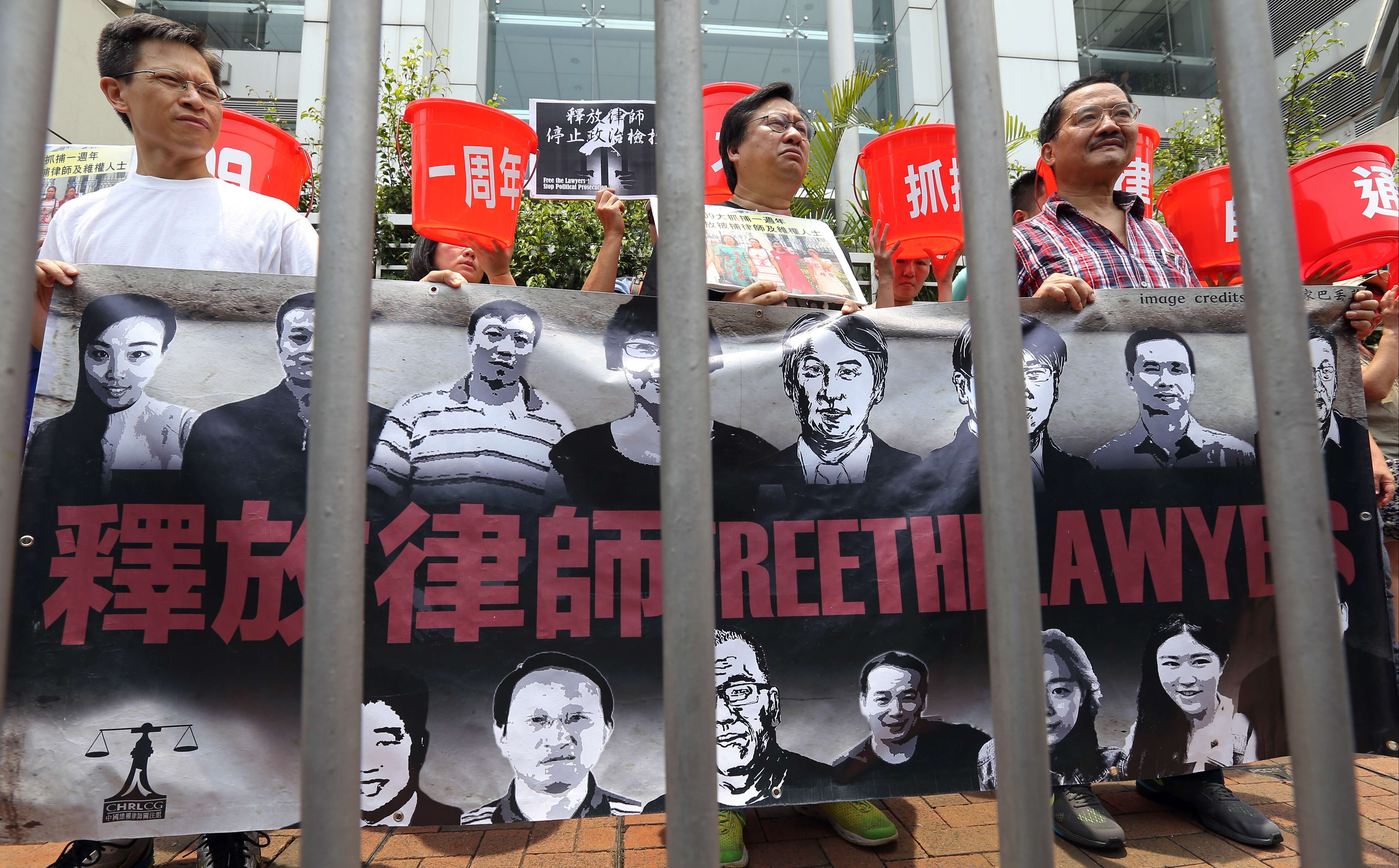 Protesters march to the central government’s liaison office in Hong Kong to mark the first anniversary of the mass arrest of human rights lawyers on the mainland, last July 9. Photo: Dickson Lee