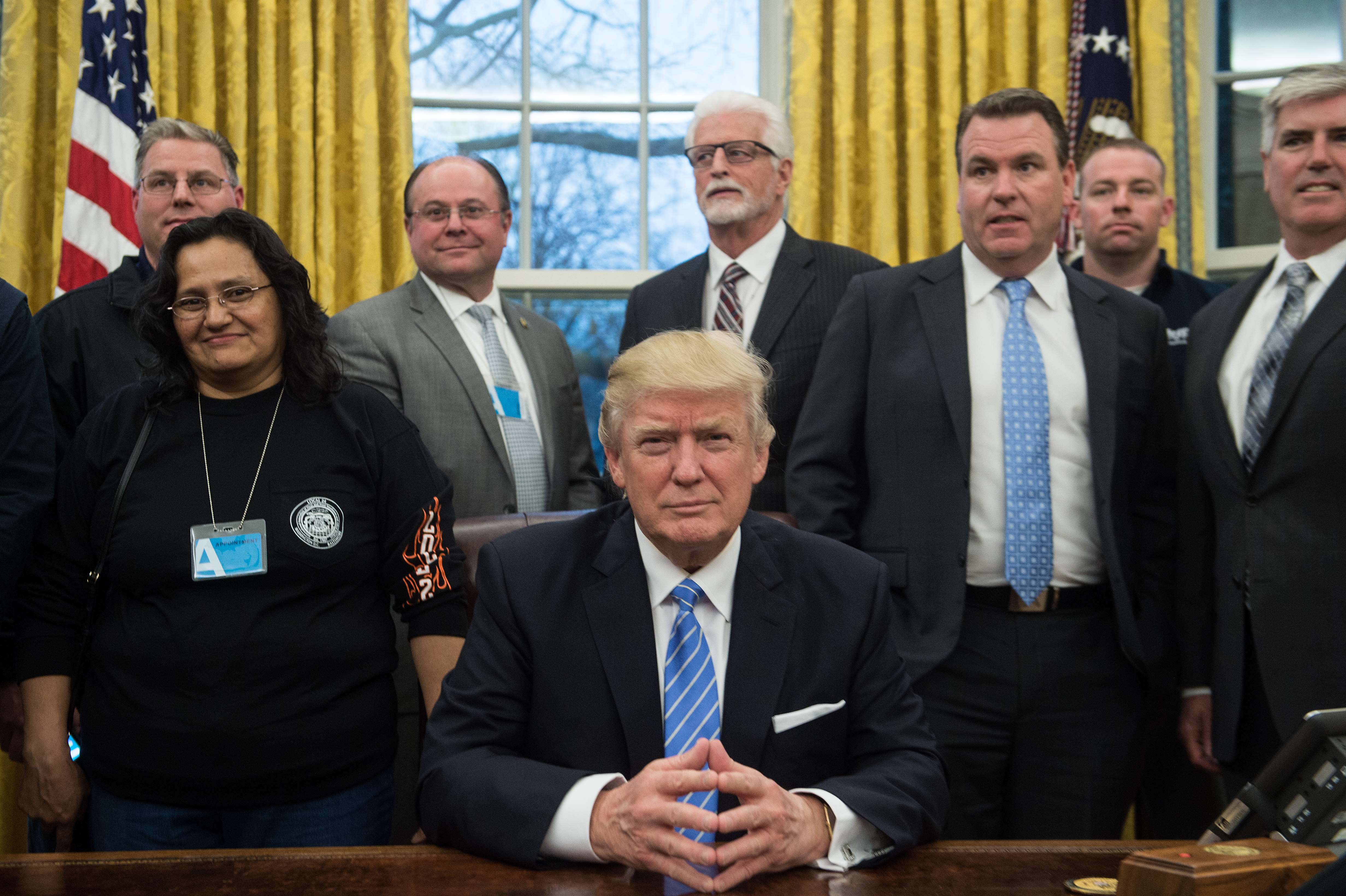 US President Donald Trump poses with labour leaders in the Oval Office at the White House. So here we are. Trump is president. He’s given the speech. Now comes the tricky bit. Photo: AFP