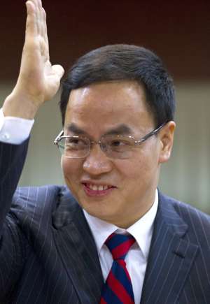 FILE - In this file photo taken Wednesday, Jan. 9, 2013, Li Hejun, chairman and CEO of Hanergy Group Ltd., gestures during a press conference at the company's headquarters in Beijing, China. In 2014, Hanergy was ranked No. 23 on the MIT Technology Review’s list of the world’s 50 “smartest companies.” (AP Photo/Alexander F. Yuan, File)