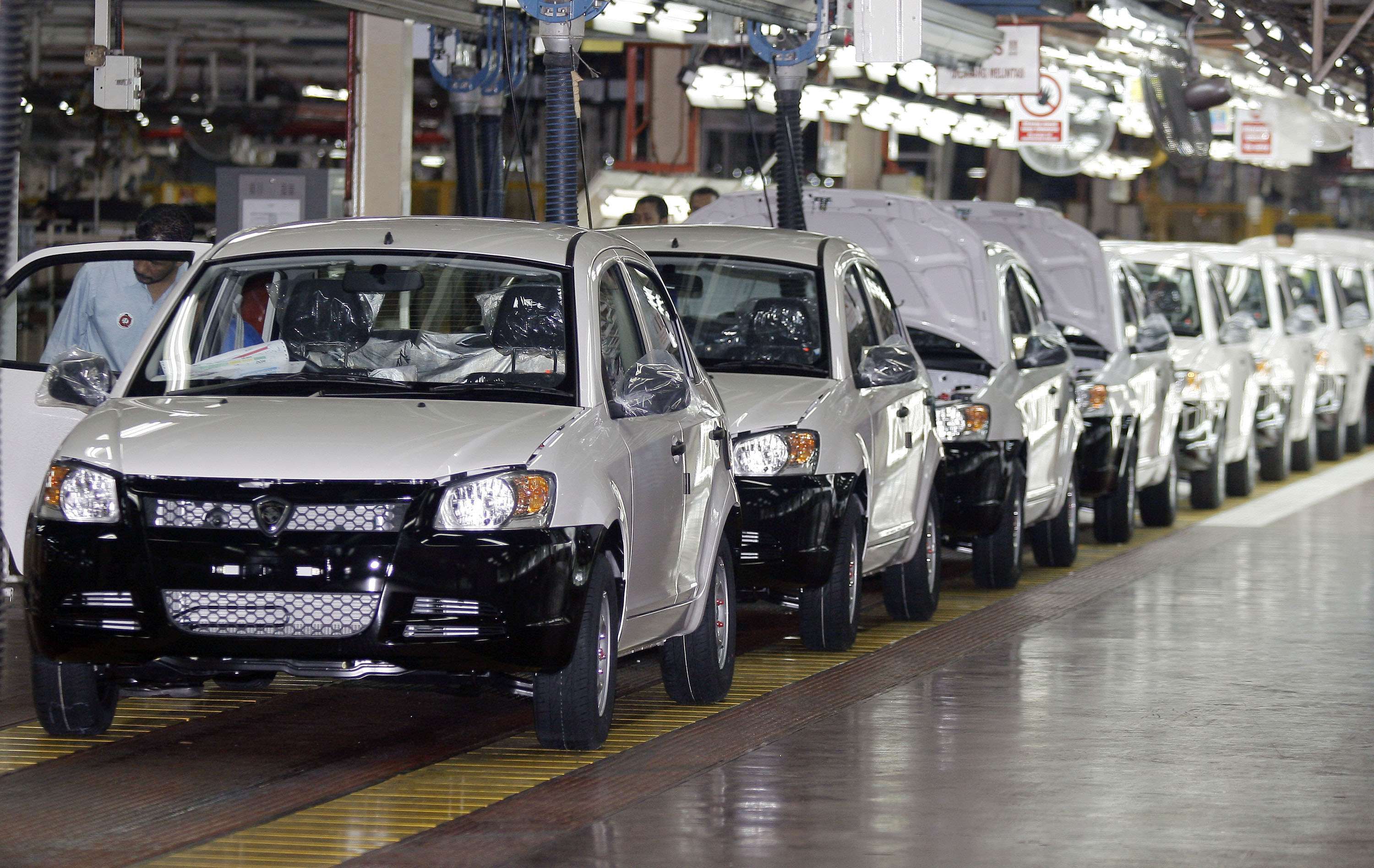 Proton Saga cars on the assembly line in Shah Alam. Malaysia’s former prime minister, Mahathir Mohamad, called the car a ‘symbol of Malaysians as a dignified people’. Photo: AFP