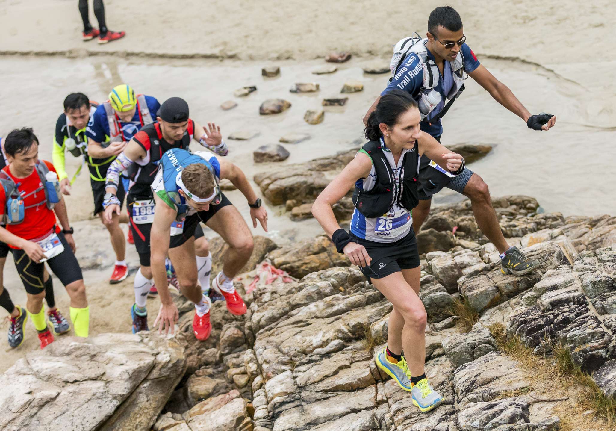 Marie McNaughton (above, right) competes in the Vibram Hong Kong 100 race in January. Around a quarter of trail racers in Hong Kong are women, and more are training with men these days. Photo: F8 Photography