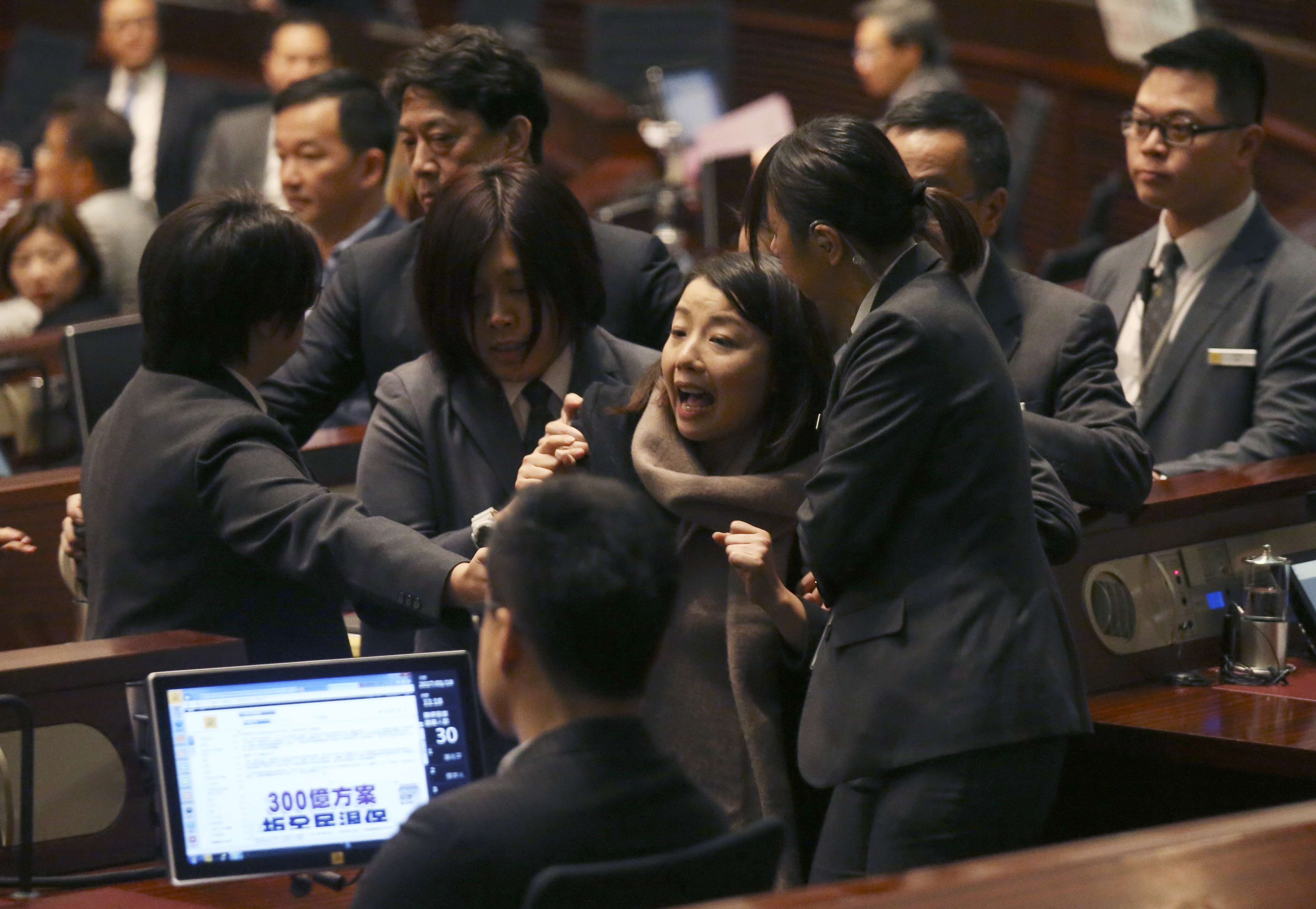 Legislator Lau Siu-lai was expelled from the chamber for playing a video during the chief executive’s question-and-answer session following his policy address last month. Photo: K. Y. Cheng