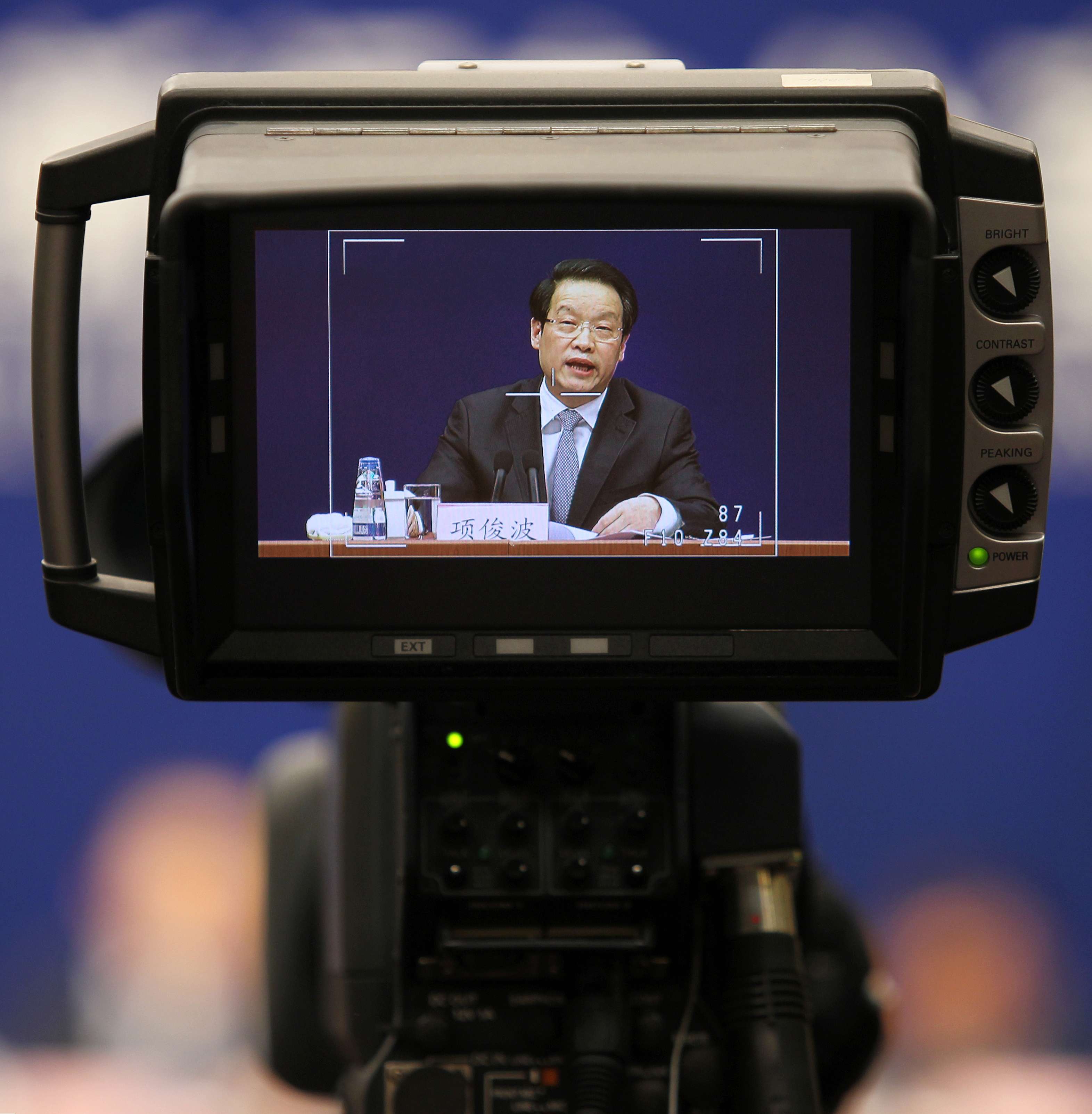 Xiang Junbo, Chairman of the China Insurance Regulatory Commission, speaking at his first public appearance since January 12, where he chimed in on a war of words against illicit fund raising by insurance companies, vowing to crack down on companies that breach the regulator’s rules.Photo: Simon Song
