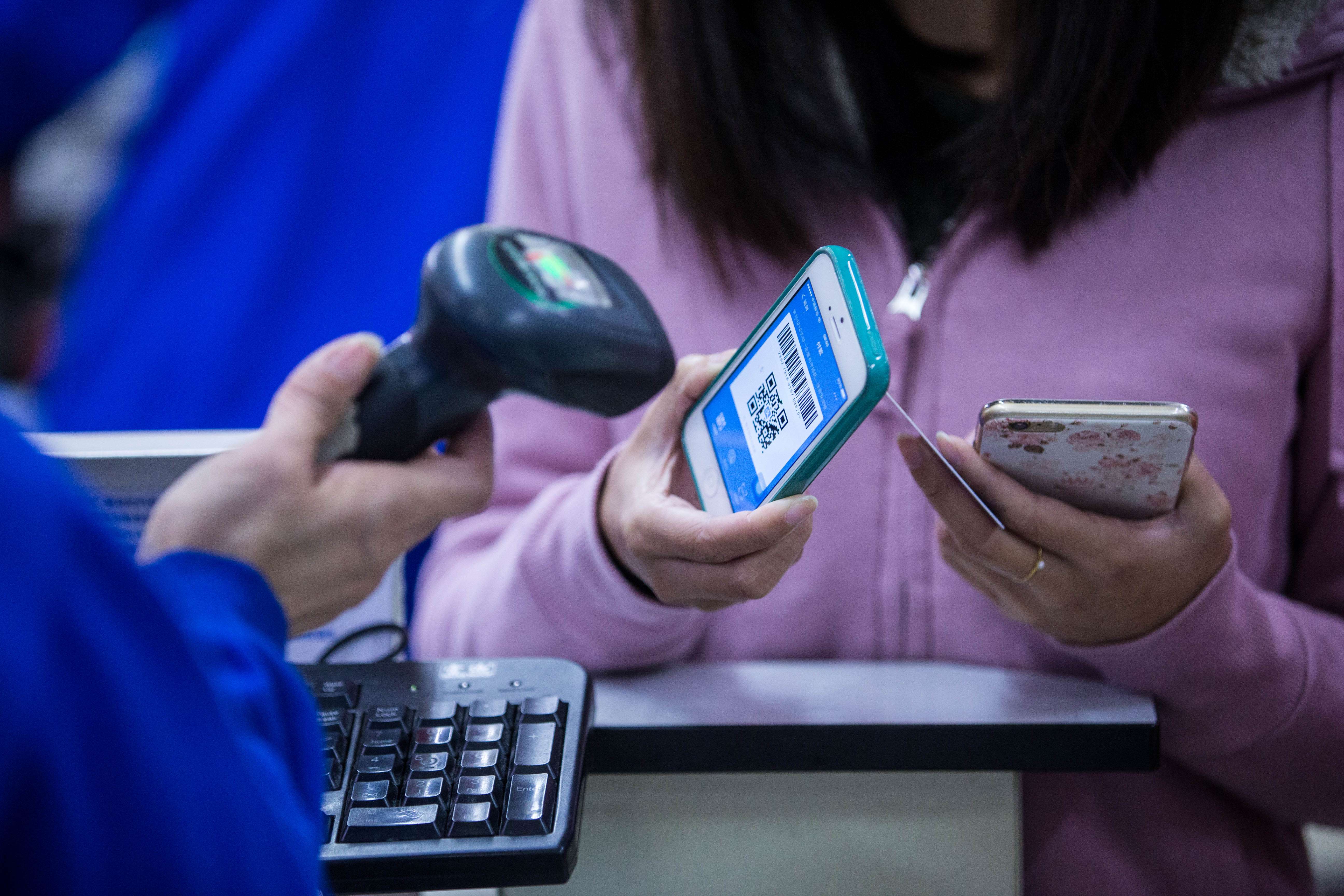 According to Network Information Centre, a state-backed agency, 469 million people in China used their smart devices to make payments in 2016, an increase of 31.2 per cent from a year ago. Photo: Imaginechina