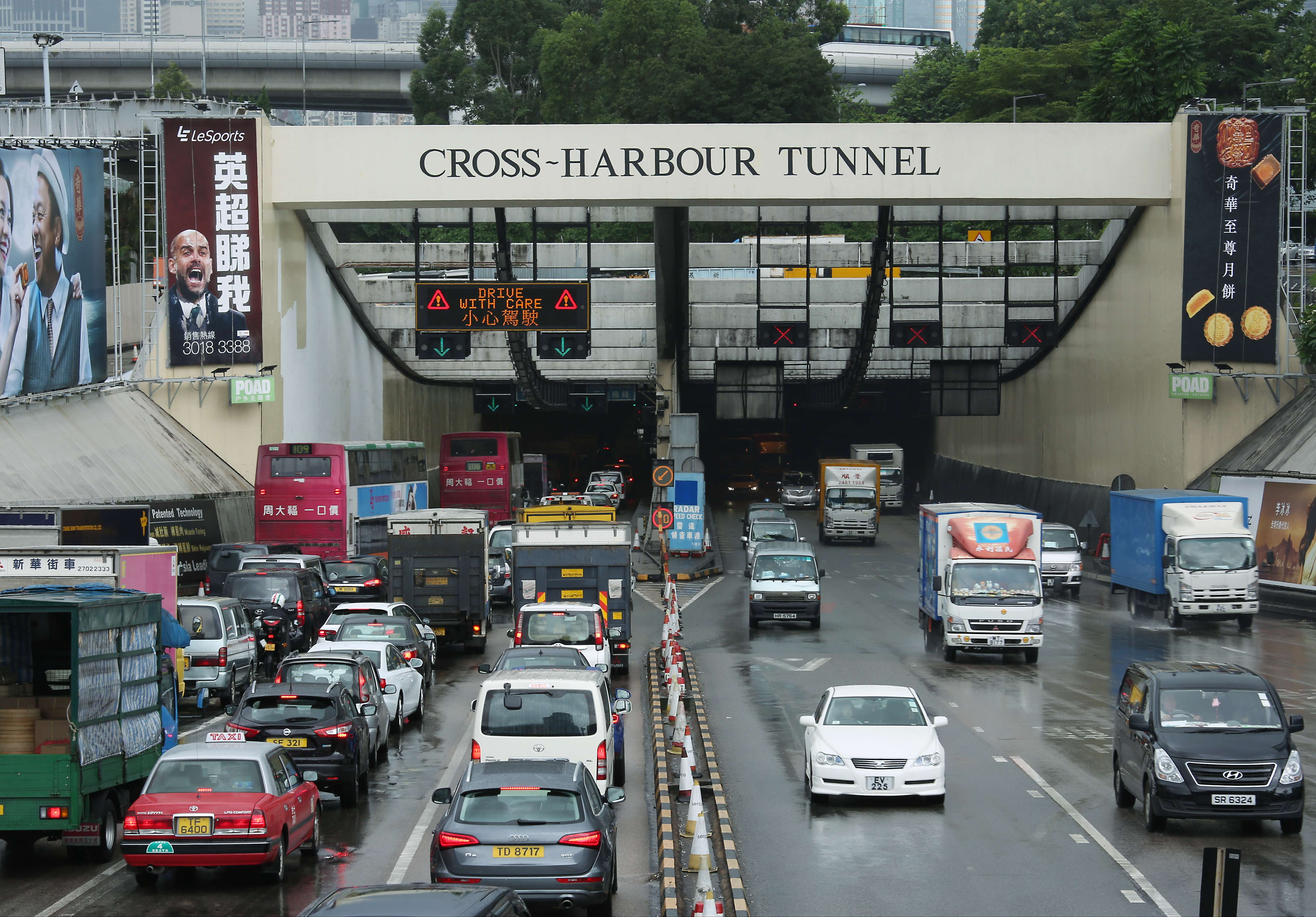 Slow traffic on the Tsim Sha Tsui end of the Cross-Harbour Tunnel. The government should standardise the tolls for the three cross-harbour tunnels, enabling drivers to choose the tunnel that suits their destination rather than one that’s the cheapest. Photo: Nora Tam