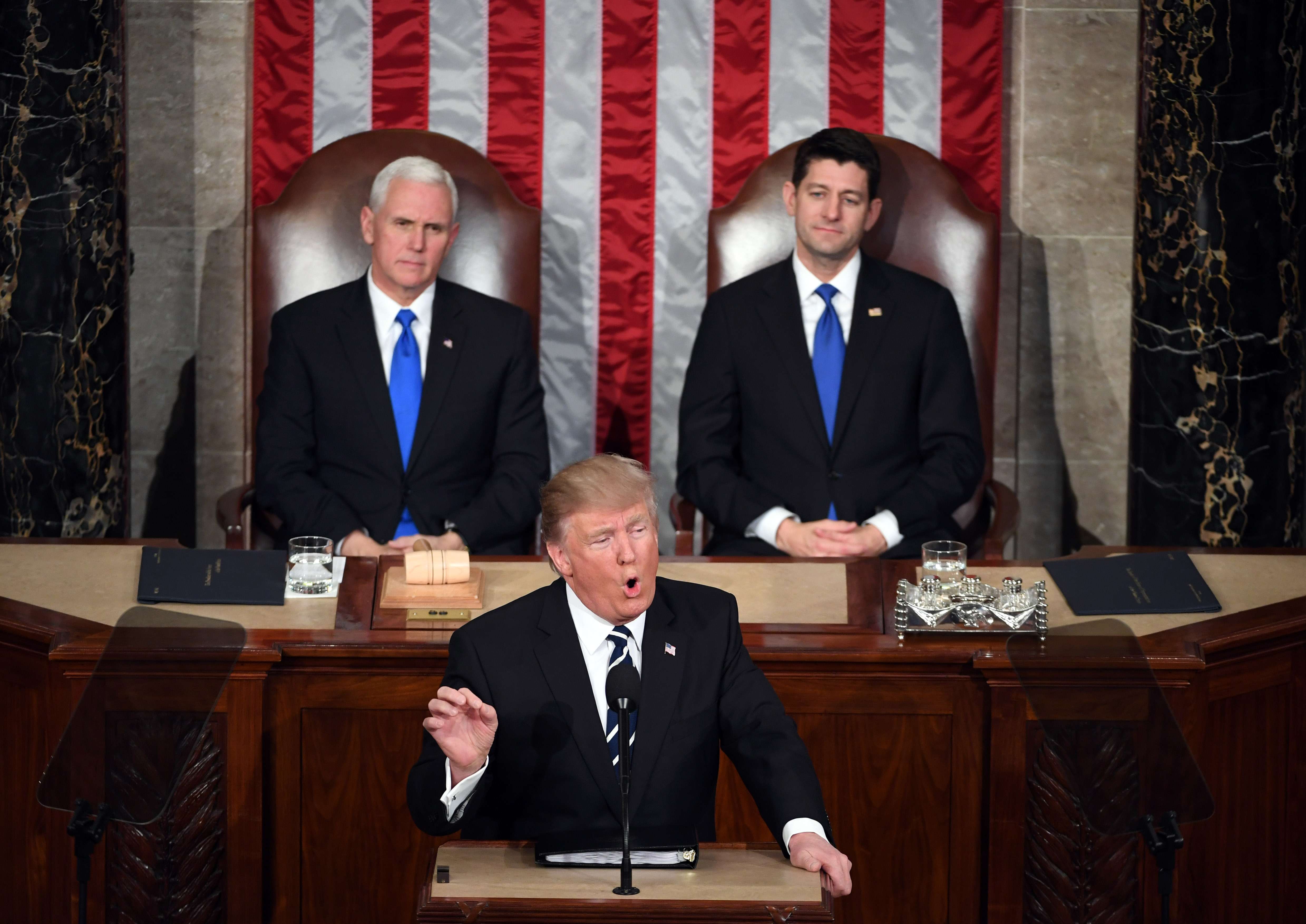 US President Donald Trump addresses a joint session of Congress, as Vice-President Mike Pence (left) and House Speaker Paul Ryan listen, in Washington on February 28. Photo: Xinhua