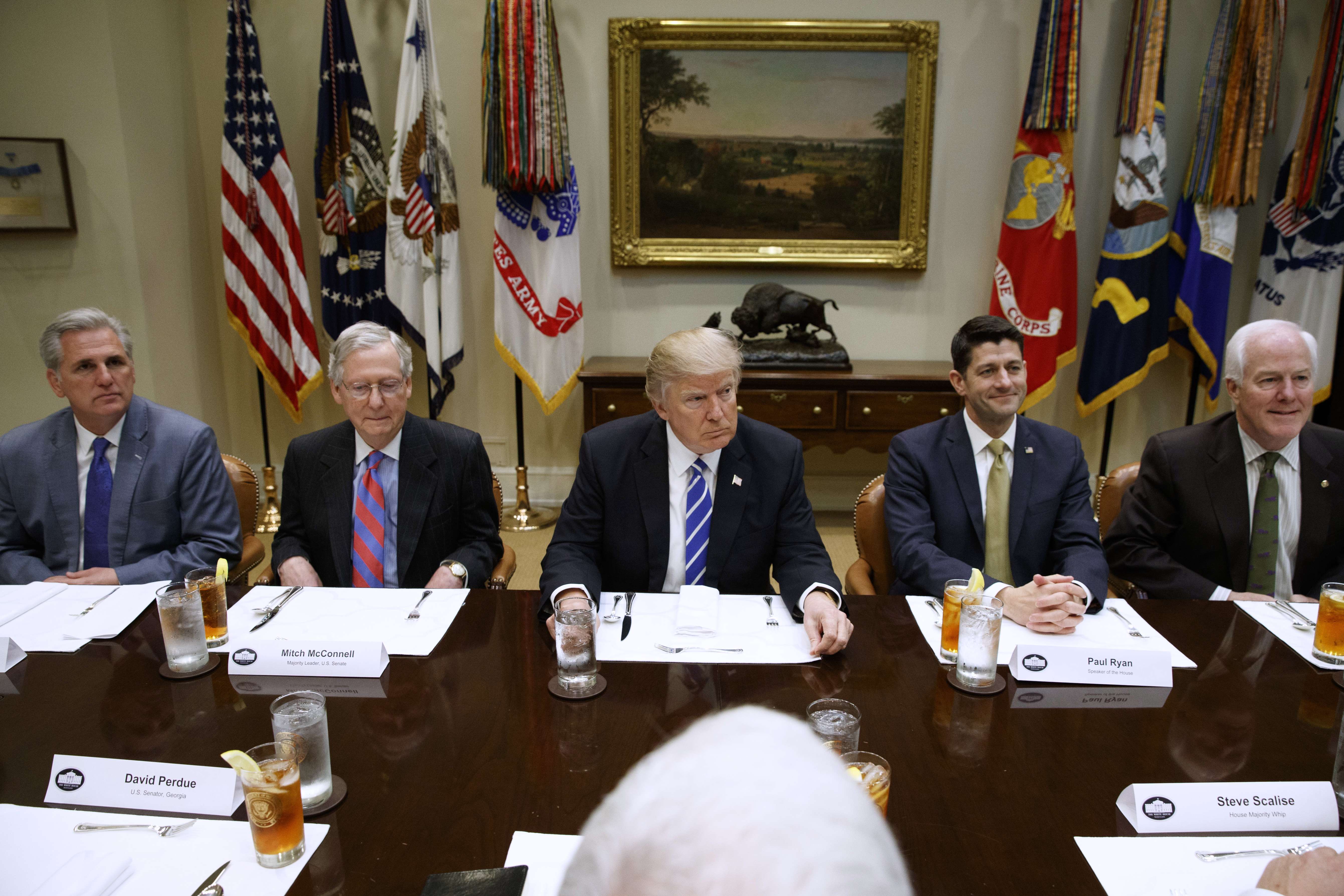 US President Donald Trump hosts a meeting with the House and Senate leadership in the White House on March 1. Among the attendees are (from left) House Republican leader Kevin McCarthy, Senate Republican leader Mitch McConnell and House Speaker Paul Ryan. Photo: AP