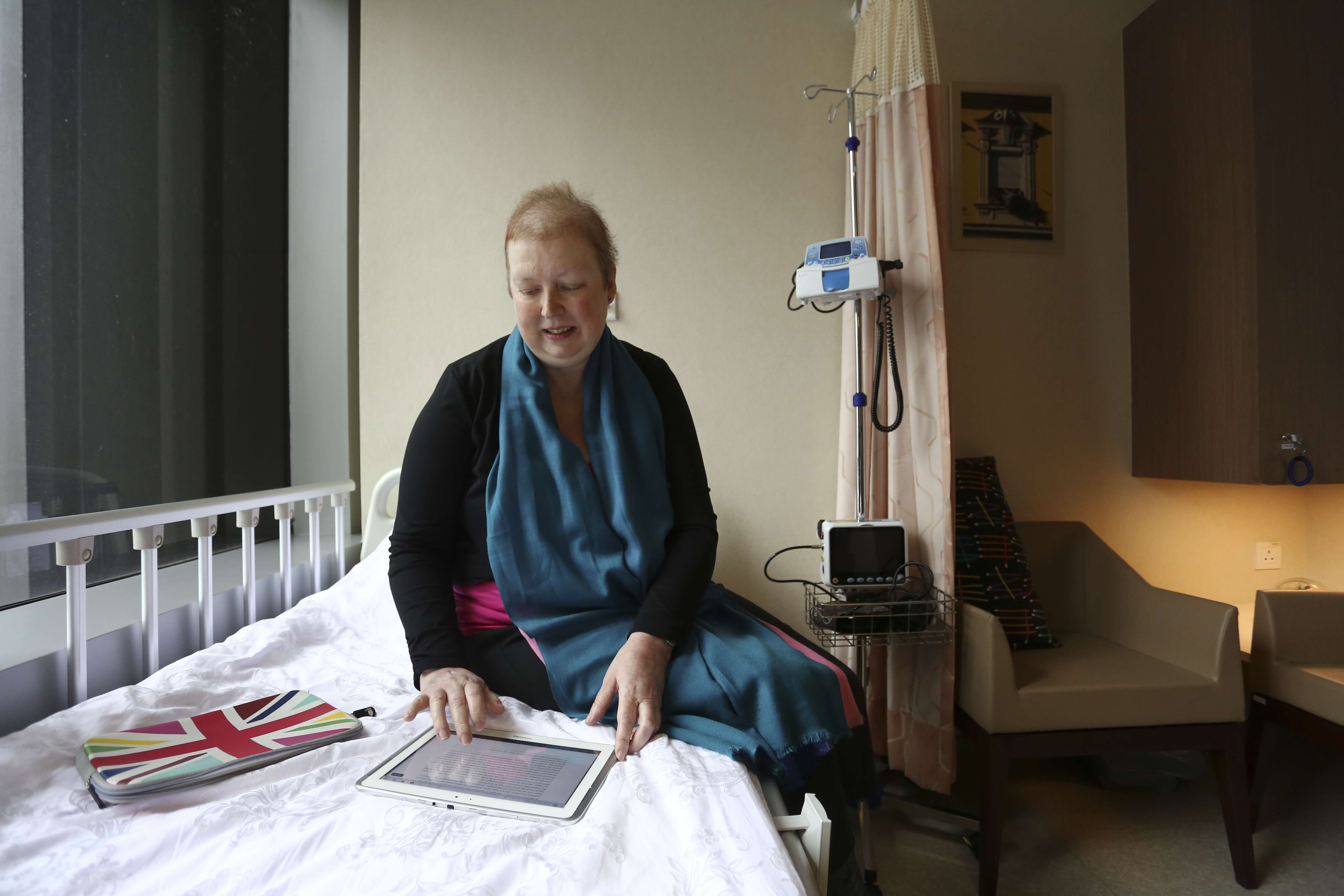 Hilary Faulkner, who is writing a book about her experience of cancer and treatment, at the Hong Kong Integrated Oncology Centre. Photo: Jonathan Wong