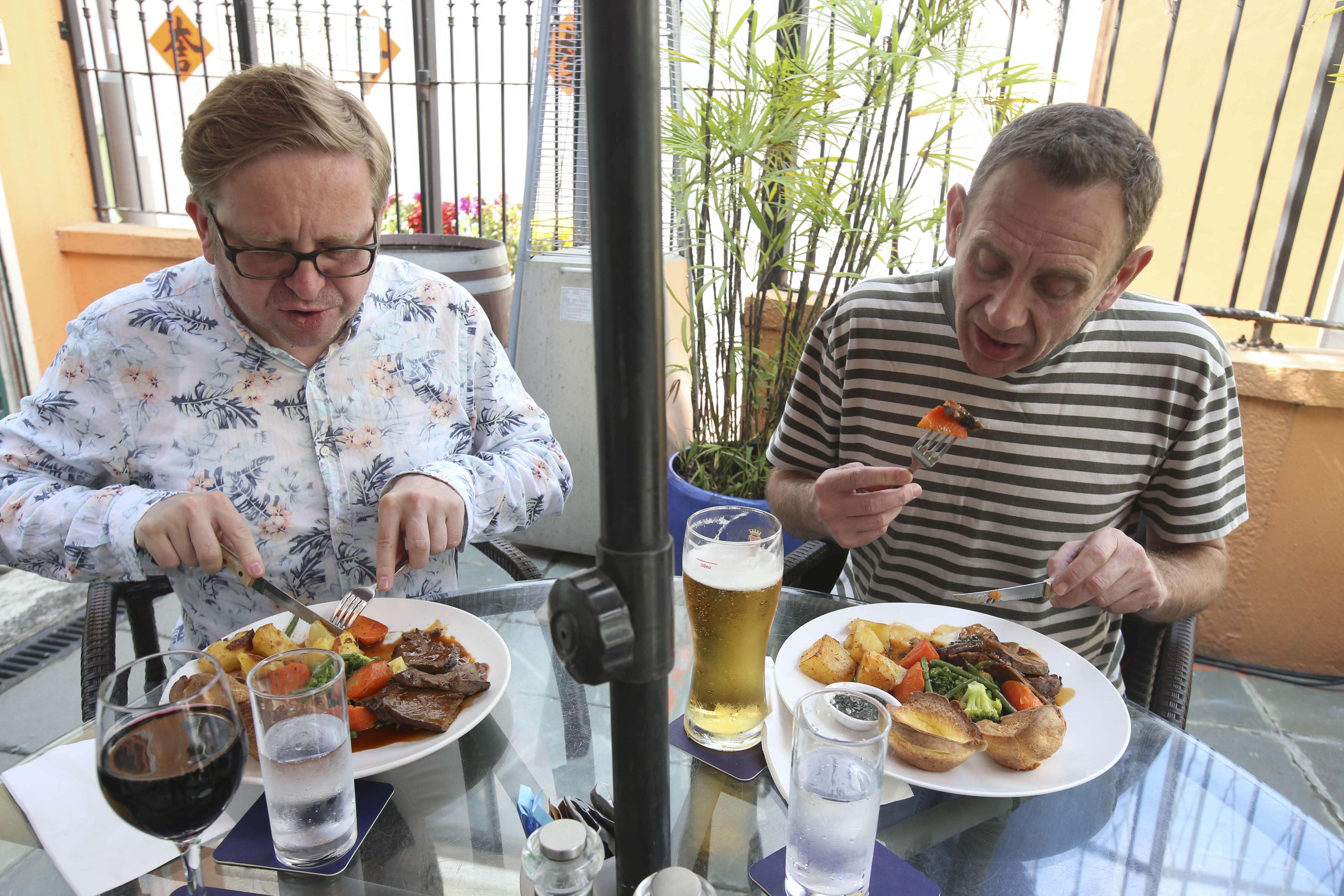 The Post’s Kevin McCardle (left) tucks into roast beef, while Mark Sharp samples the roast lamb at Steamers in Sai Kung. Photo: David Wong