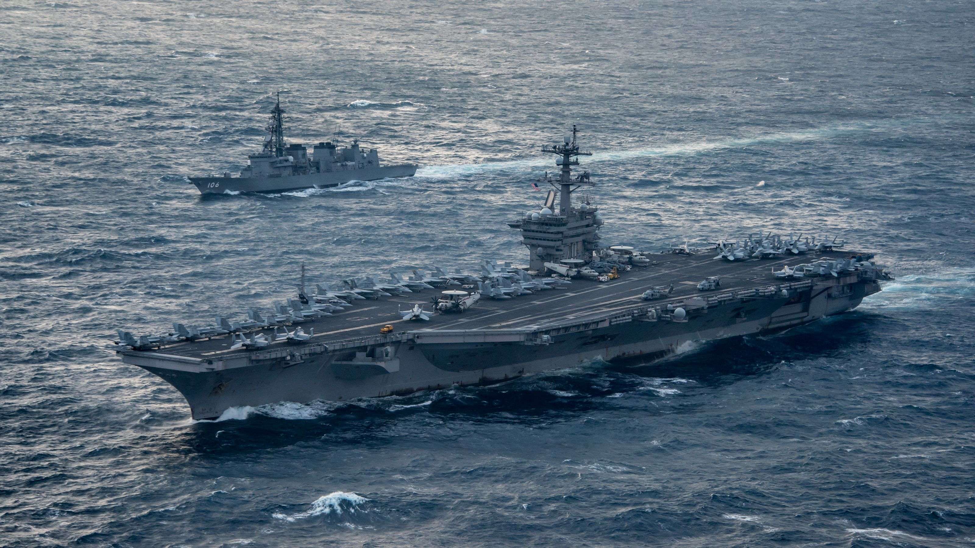 The aircraft carrier USS Carl Vinson transits the East China Sea with the Japan Maritime Self-Defence Force Murasame-class destroyer JS Samidare in March. Photo: AFP