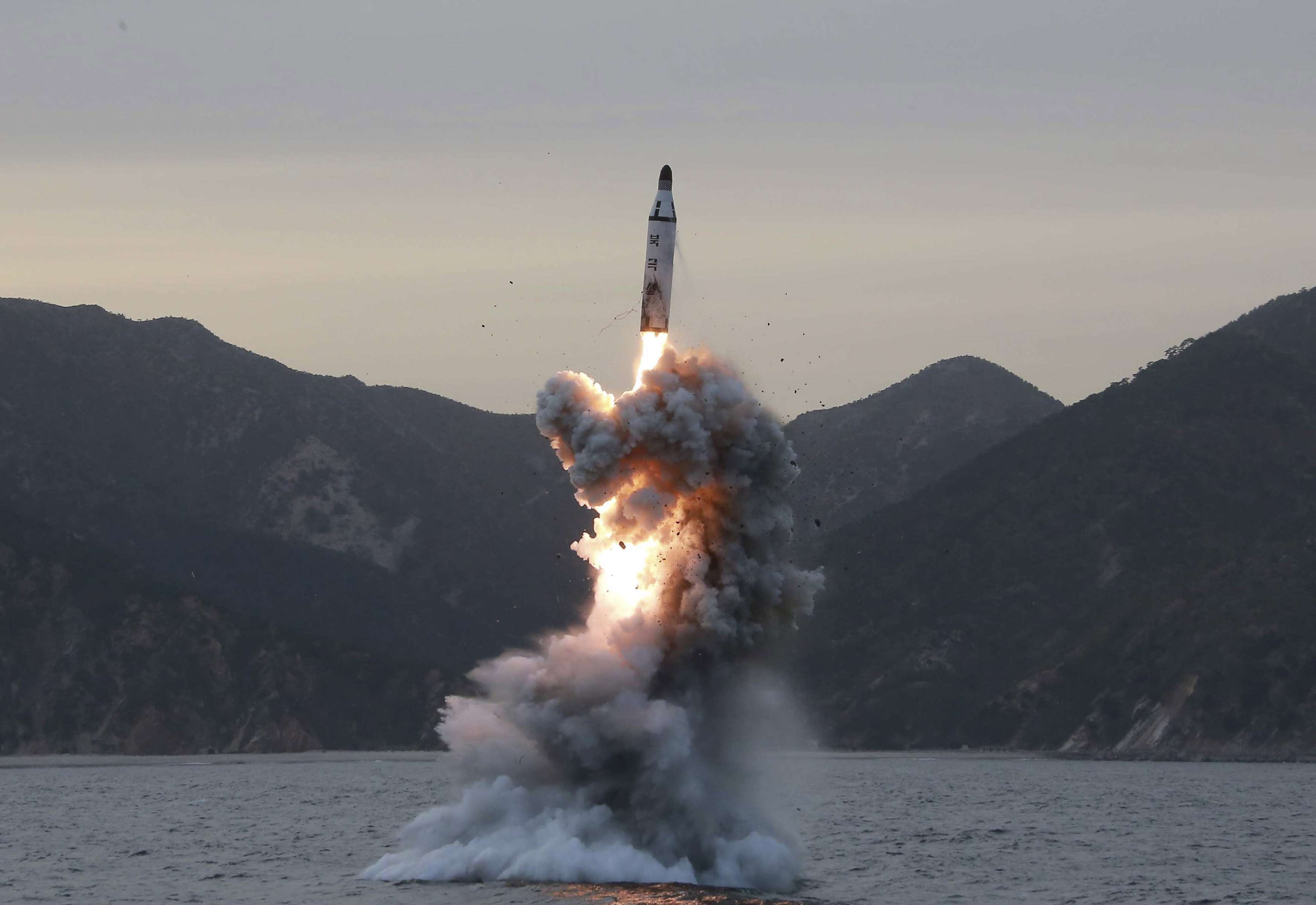 An undated photo released last April by the North Korean Central News Agency of a test firing of a missile from a submarine. Photo: EPA