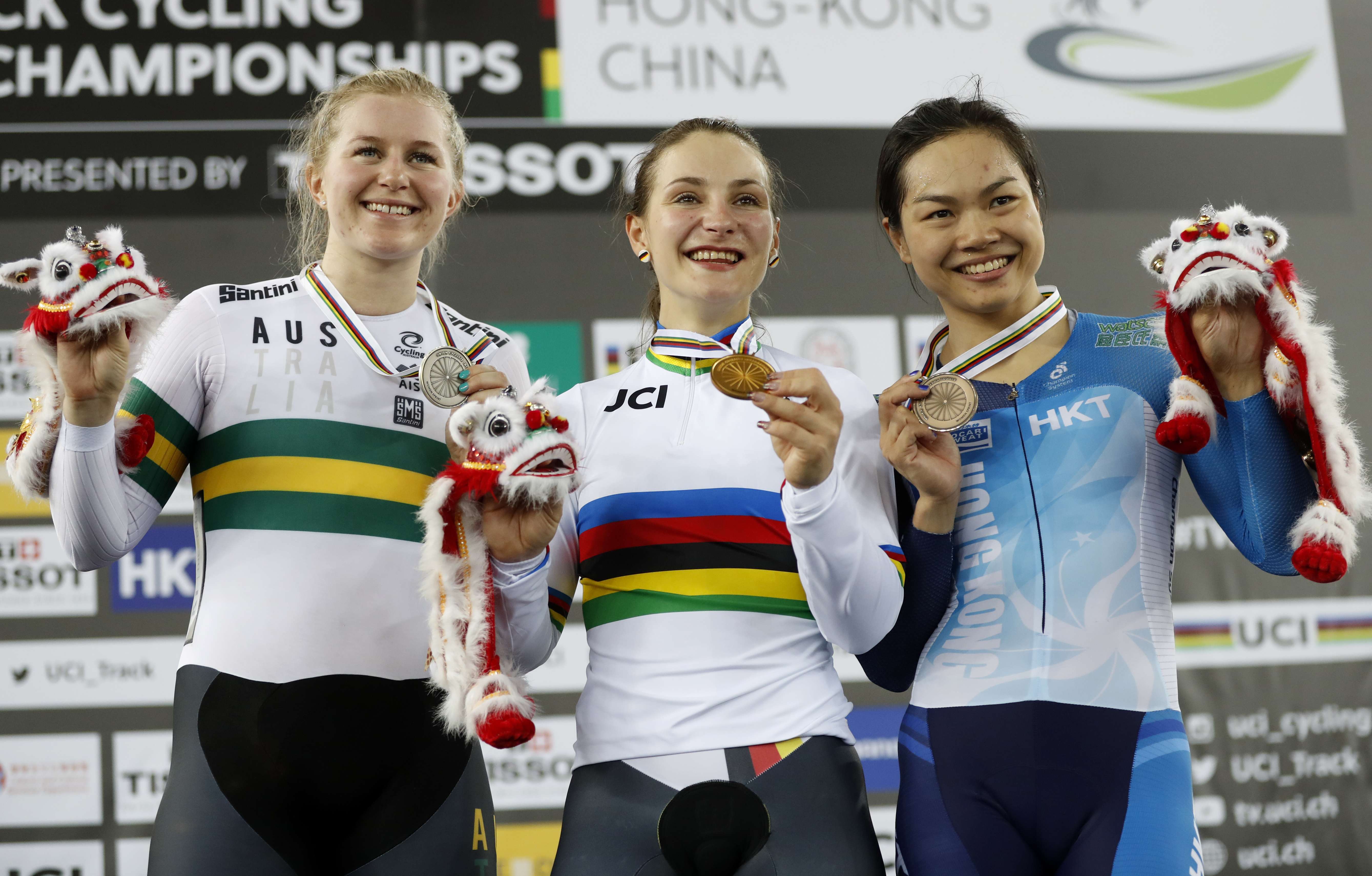 Hong Kong’s Sarah Lee celebrates her bronze medal with the sprint winner, Germany's Kristina Vogel (centre), and silver medallist Australia's Stephanie Morton at the UCI Track Cycling World Championships in Hong Kong. Photo: AP