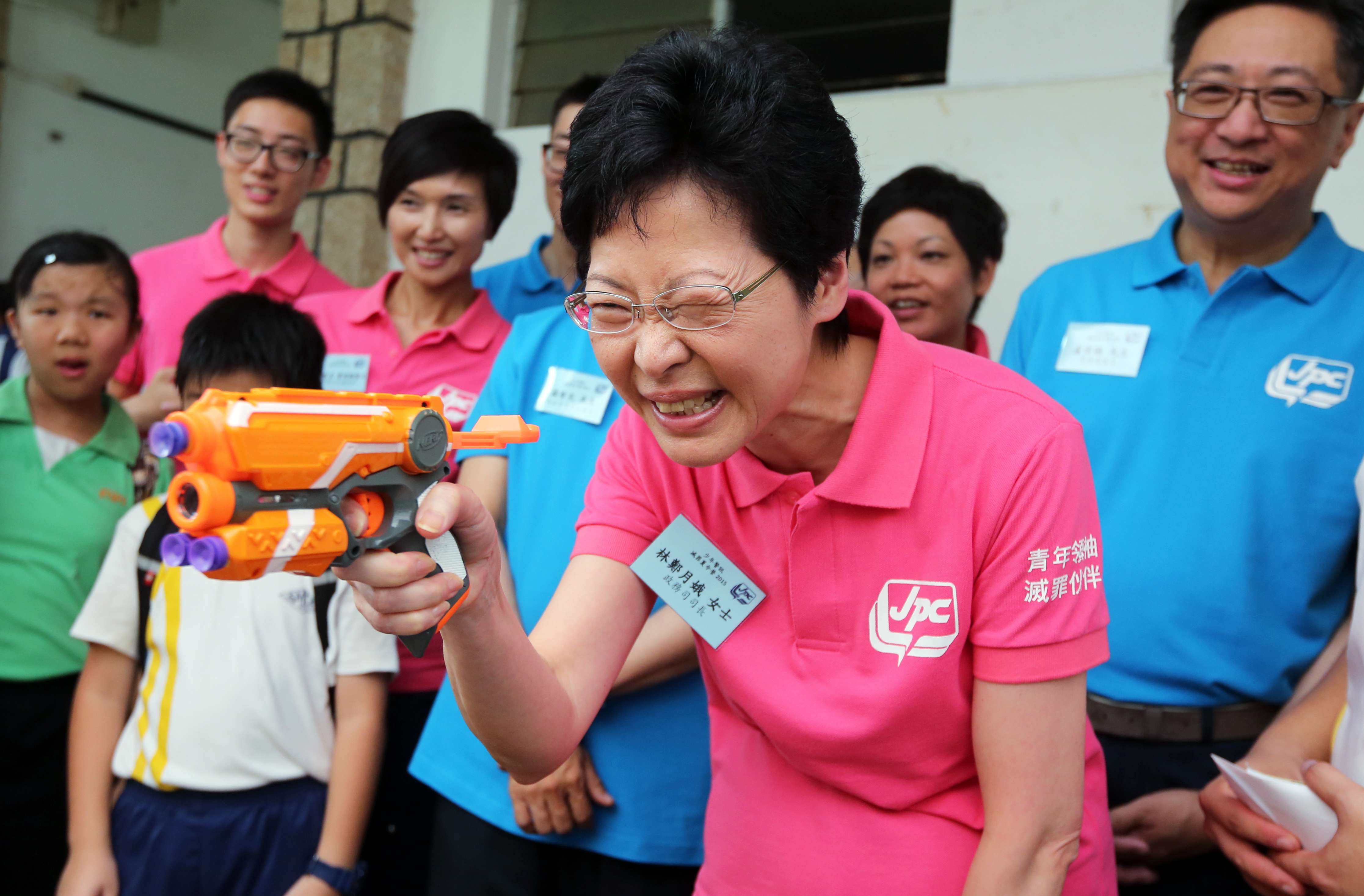 Then chief secretary Carrie Lam visits the Junior Police Call crime-fighting summer camp at Wu Kwai Sha Youth Village in Ma On Shan, on August 12, 2015. Lam’s manifesto for the chief executive election in March placed special emphasis on youth engagement. Photo: Edward Wong
