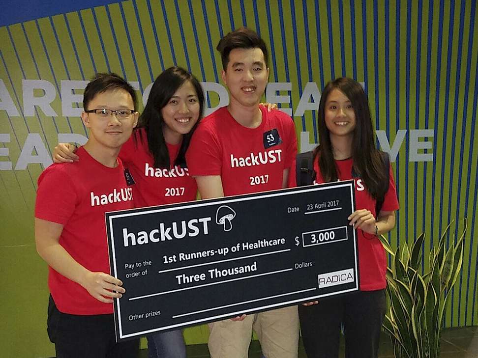 Team Docta (from left) Ken Wong, Susan Chan, Justin Liu and Chantal Neo win second prize at hackUST. Photo: Stuart Heaver