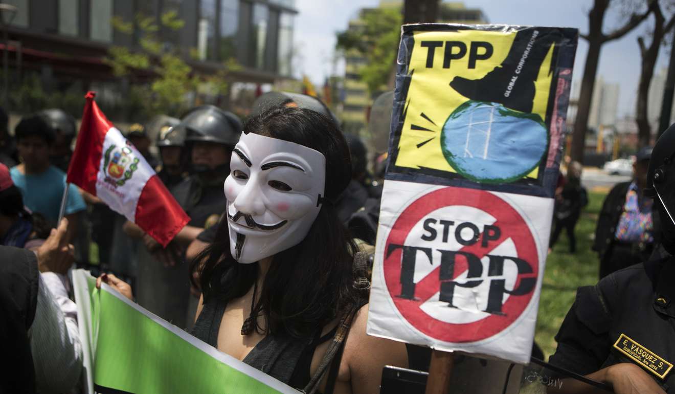 As leaders of the Asia-Pacific Economic Cooperation (Apec) forum met in Lima, Peru last November, dozens of people rallied against the TPP trade agreement. Photo: AP
