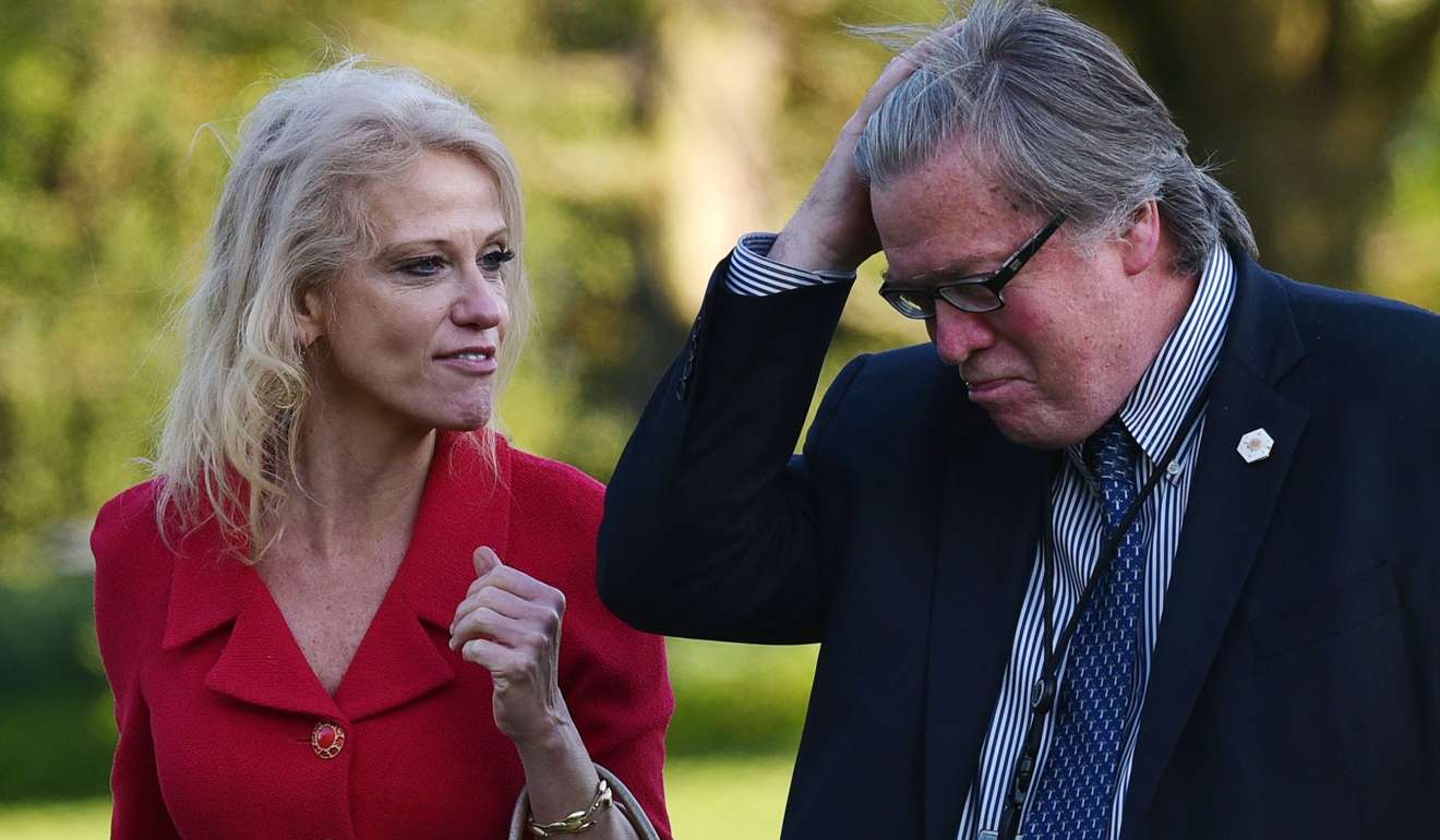 Counsellor to the president Kelleyanne Conway and White House Chief Strategist Stephen Bannon walk across the South Lawn of the White House on April 18. Photo: AFP