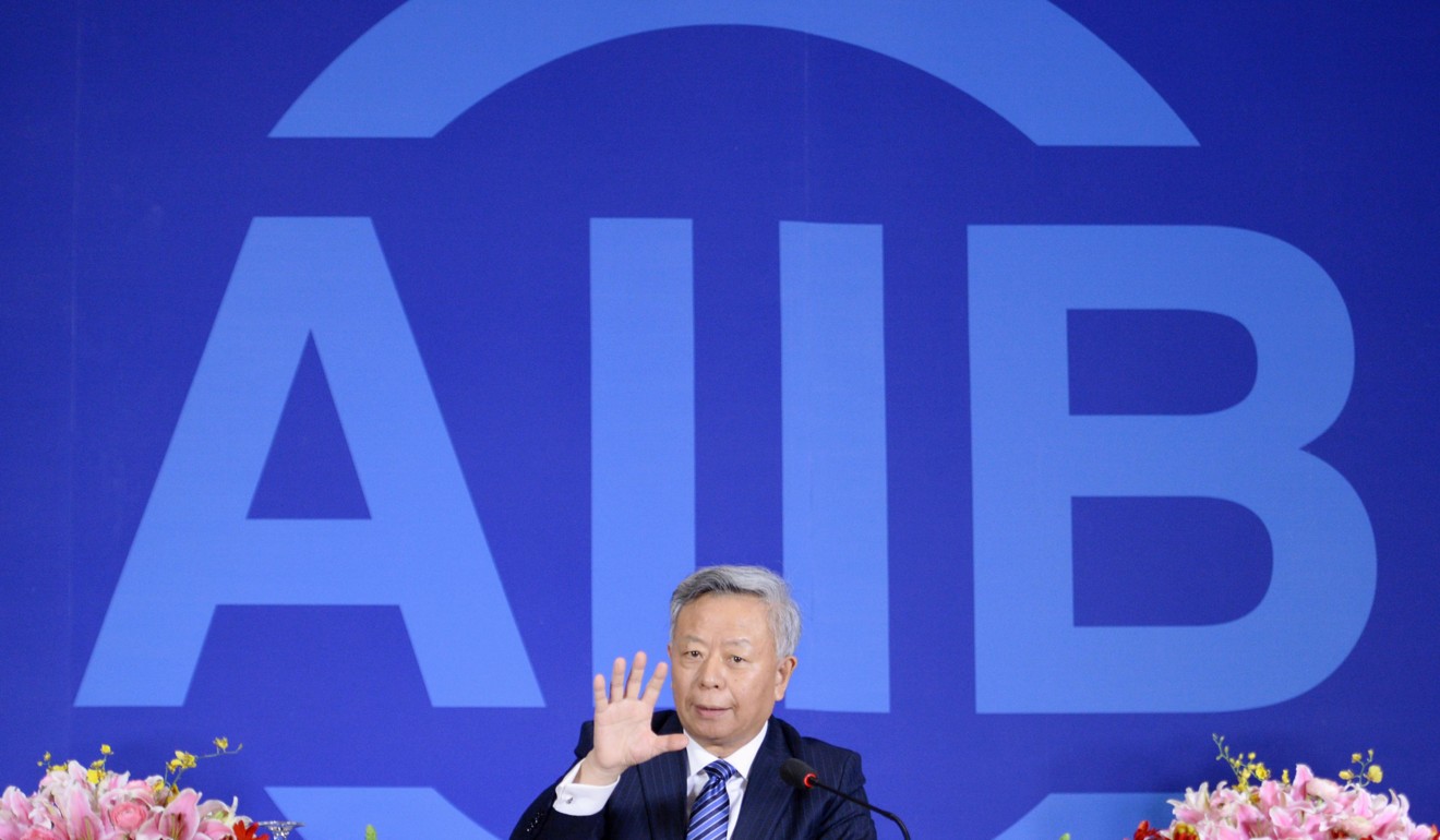Jin Liqun, the president of the Asian Infrastructure Investment Bank, speaks at a news conference in Beijing on January 17 last year, a day after the bank was launched. Photo: Kyodo