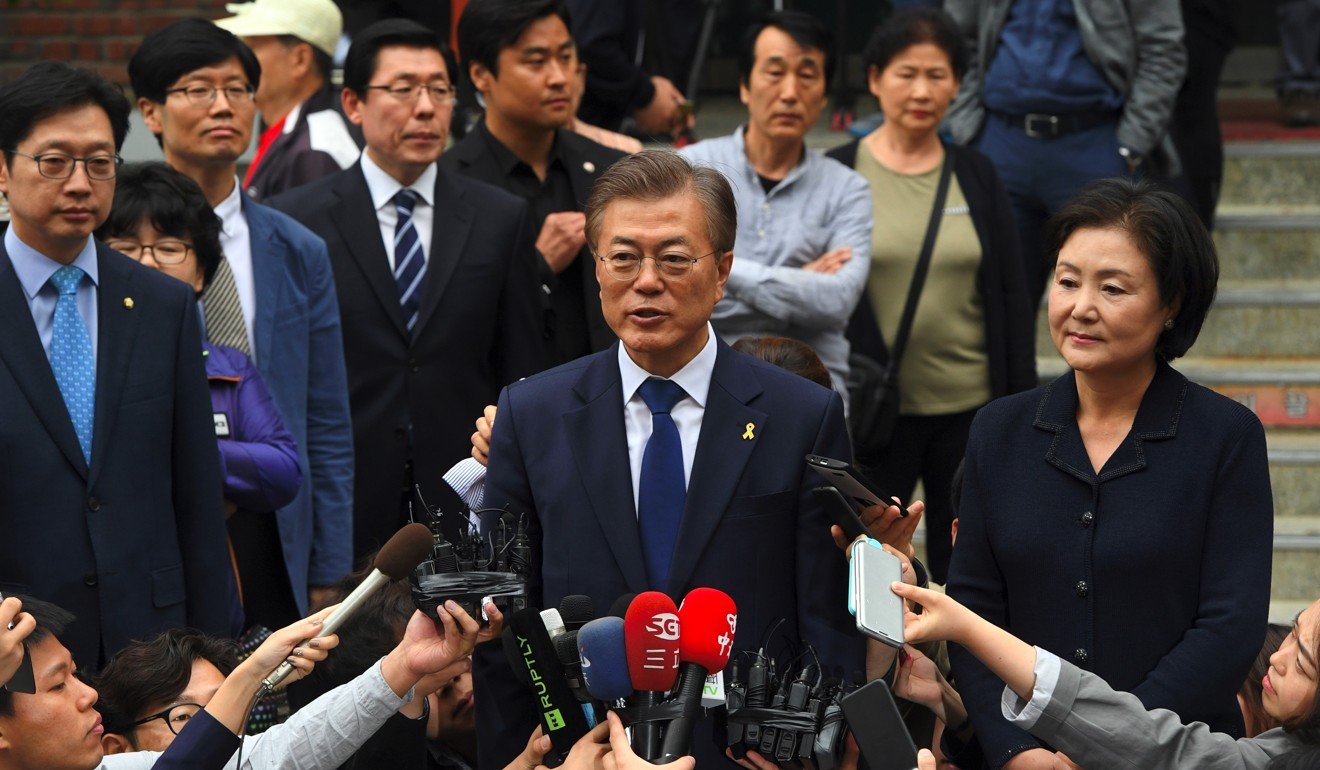 Moon Jae-in of the Democratic Party speaks to the media after casting his ballot at a polling station in Seoul. Photo: AFP