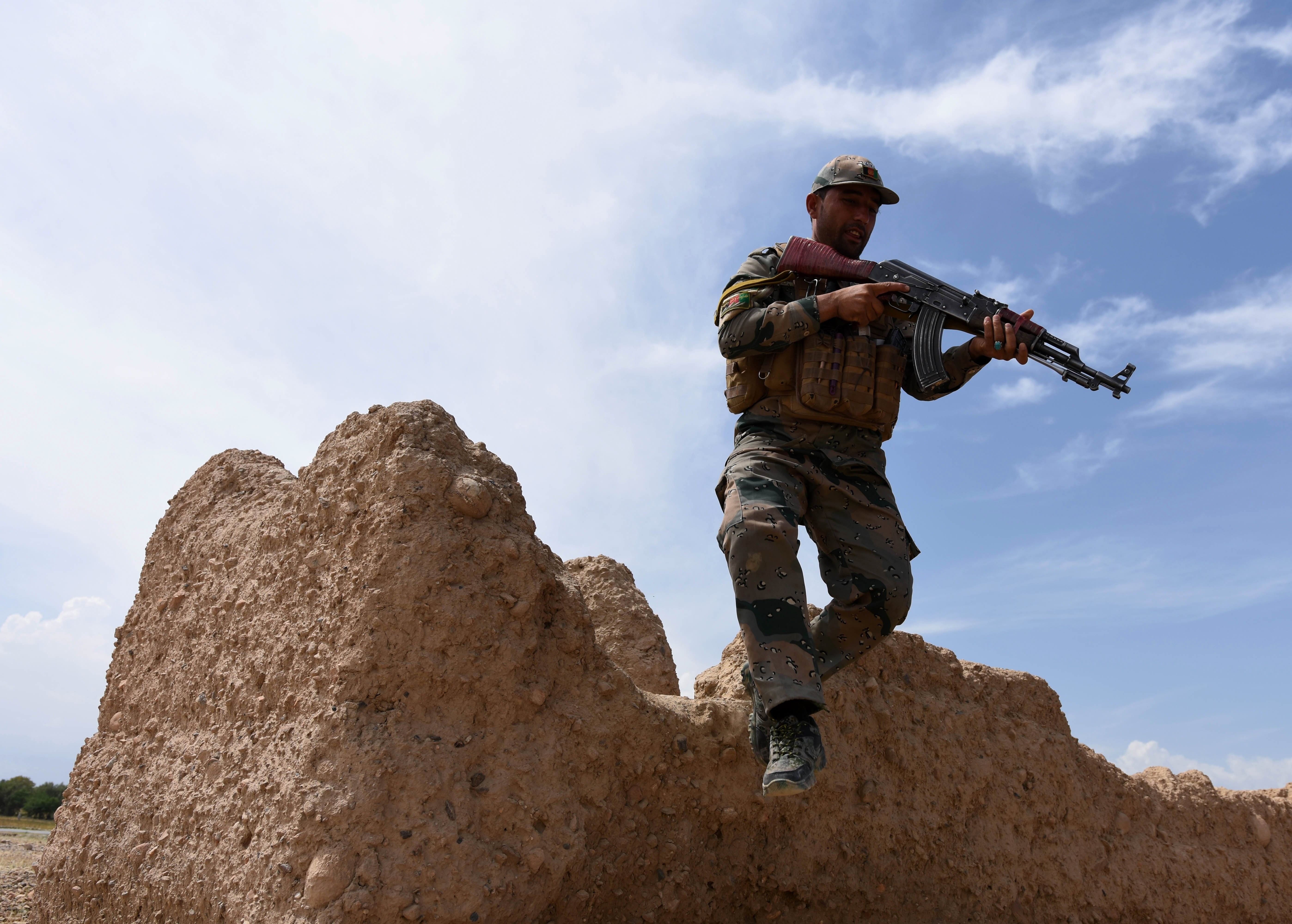 An Afghan security officer takes position during an operation against Islamic State in Chaparhar district, Nangarhar province, Afghanistan, on Monday. Islamic-State-sponsored terrorism poses a major challenge to the stability of Afghanistan and Pakistan. Photo: EPA