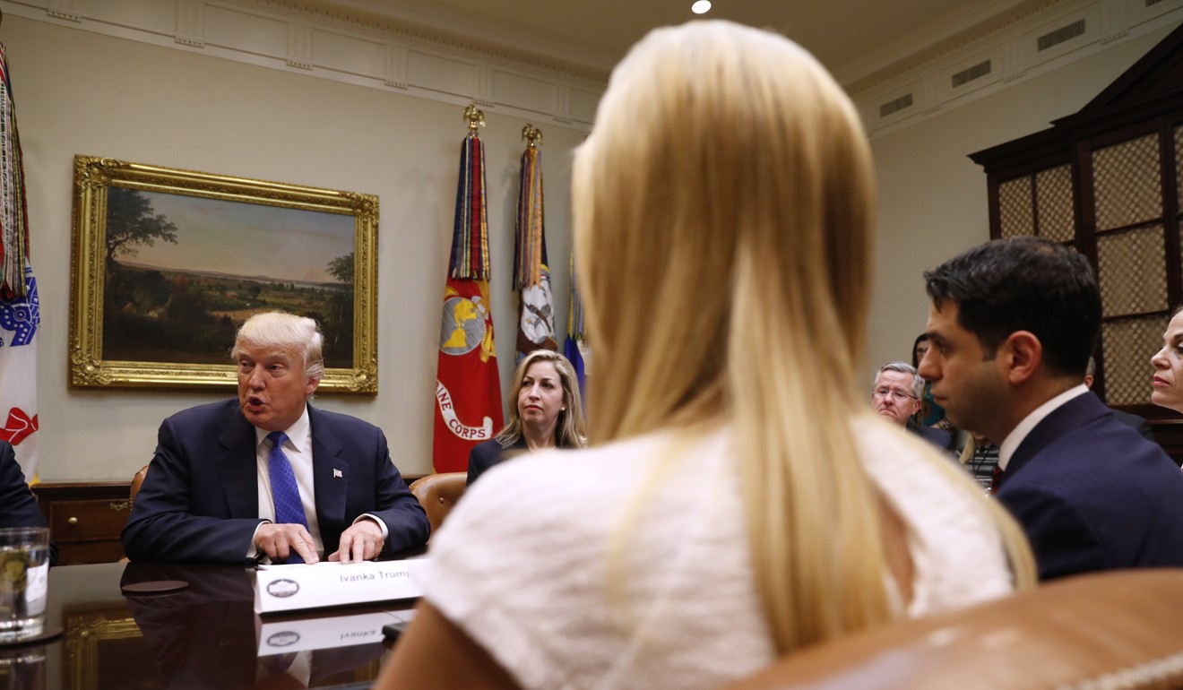 President Donald Trump and his daughter Ivanka Trump participate in a meeting on domestic and international human trafficking in the Roosevelt Room of the White House. The President has further delayed a decision on the Paris climate deal. Photo: AP