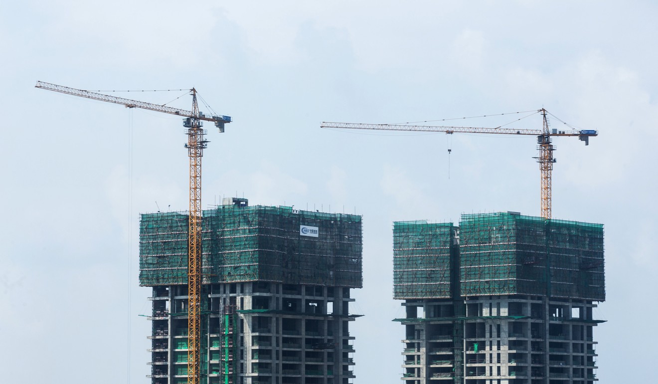 Cranes rise over the under construction Shangri-La Hotel in Colombo. Photo: Bloomberg
