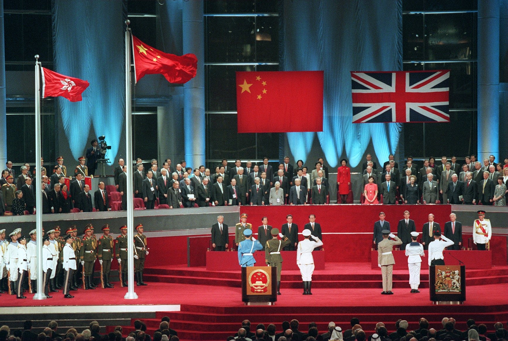 The Union Jack is lowered minutes before midnight on June 30, 1997, during the Hong Kong handover ceremony. Photo: Robert Ng