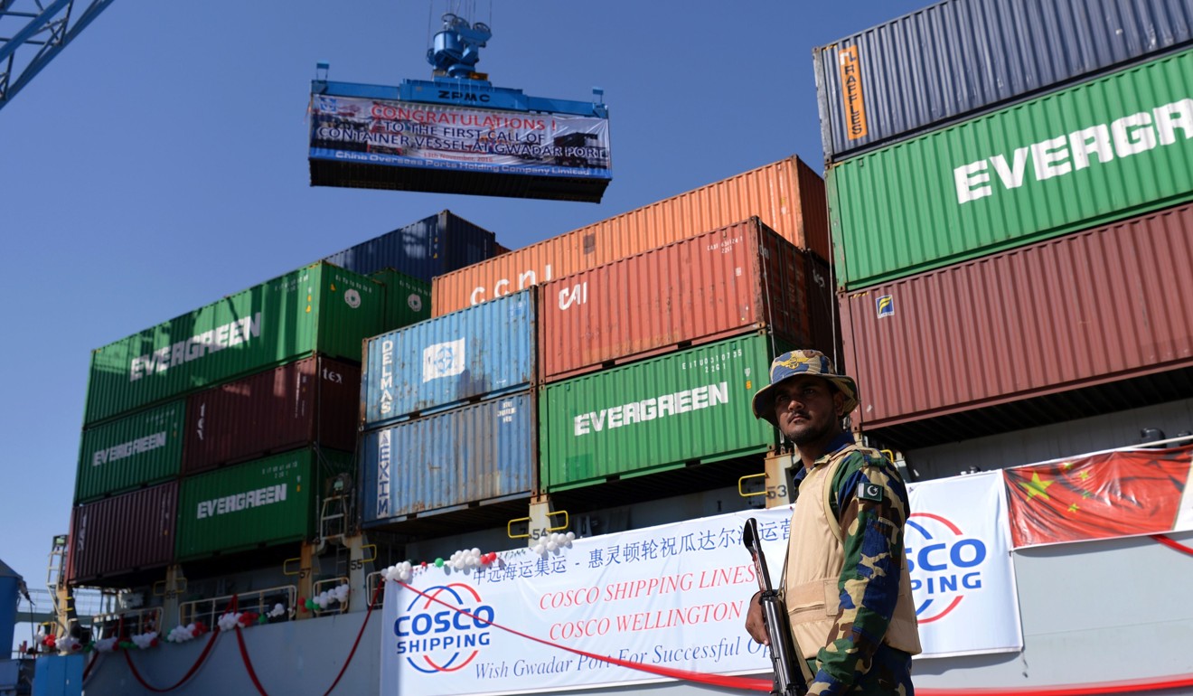 A Pakistani naval personnel stands guard beside a ship carrying containers during the opening of a trade project in Gwadar port, some 700km west of Karachi in this 2016 file photo. At the time, Pakistan opened a trade route linking the southwestern post of Gwadar to the Chinese city of Kashgar as part of a joint multibillion-dollar project to jump-start economic growth in the South Asian country. Photo: AFP