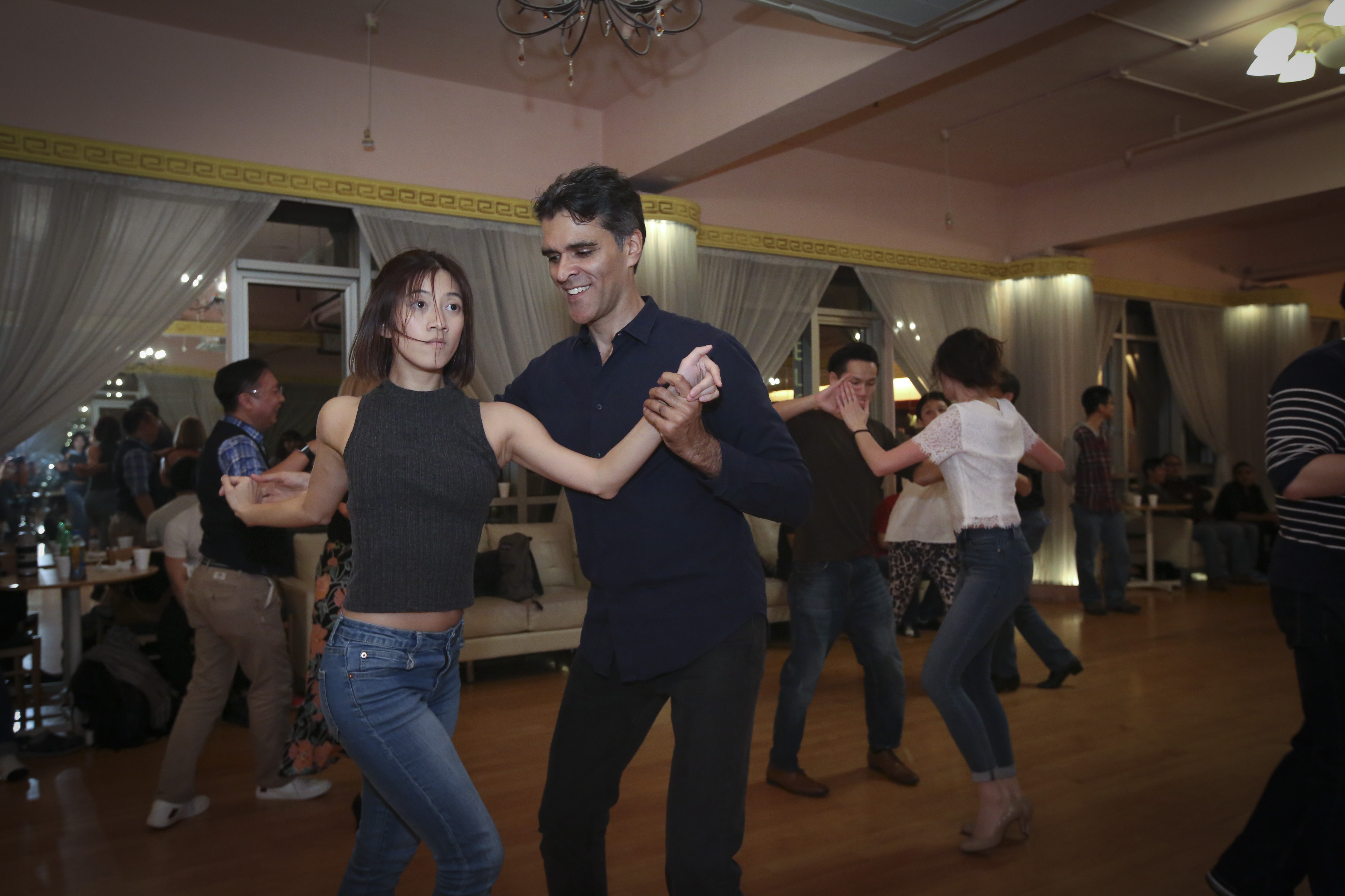 Dance teachers Sherman Mosquito (left) and Ricci Yasin (right) at a salsa dance party in Causeway Bay. Photo: Edmond So