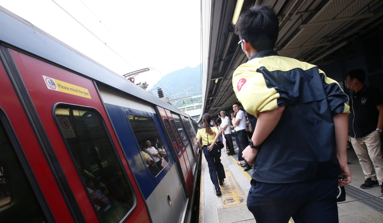 MTR staff directed passengers at East Rail Line stations. Photo: David Wong