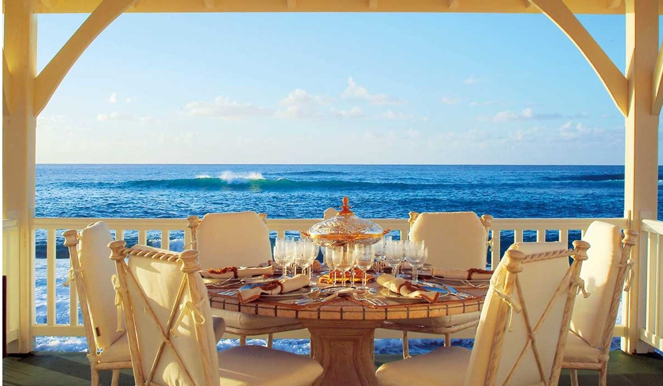 Le Chateau des Palmiers overlooks the sea, with a long stretch of private beach. Photo: Sotheby's International Realty