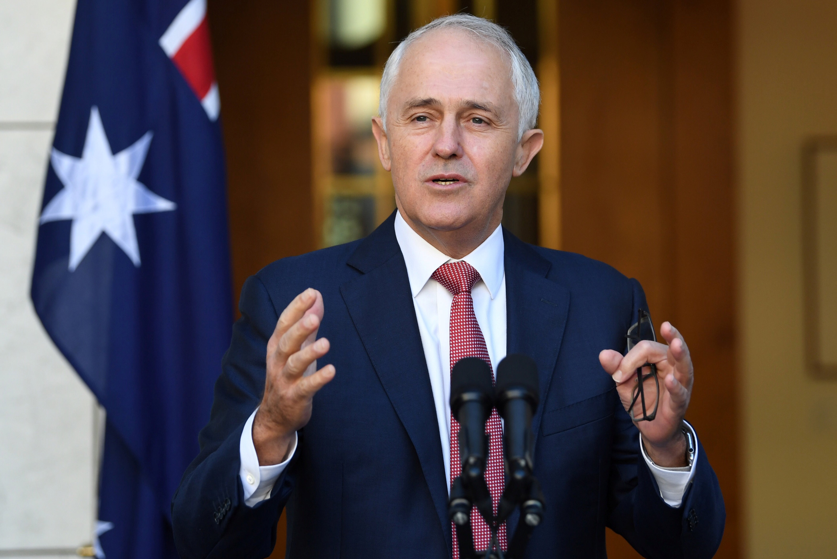 Prime Minister Malcolm Turnbull said his government would “no longer allow 457 visas to be passports to jobs that could and should go to Australians”. Photo: Reuters