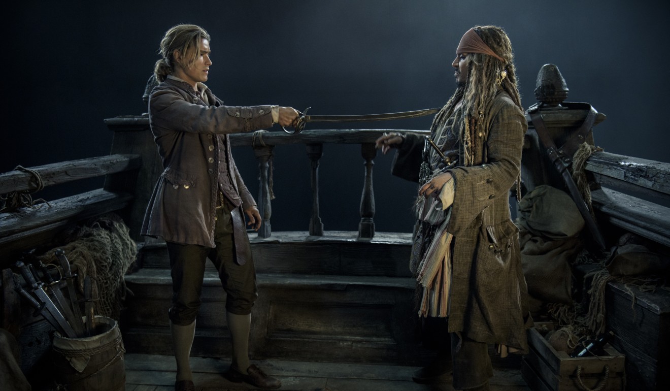 Brenton Thwaites and Depp in a still from Pirates of the Caribbean: Dead Men Tell No Tales.