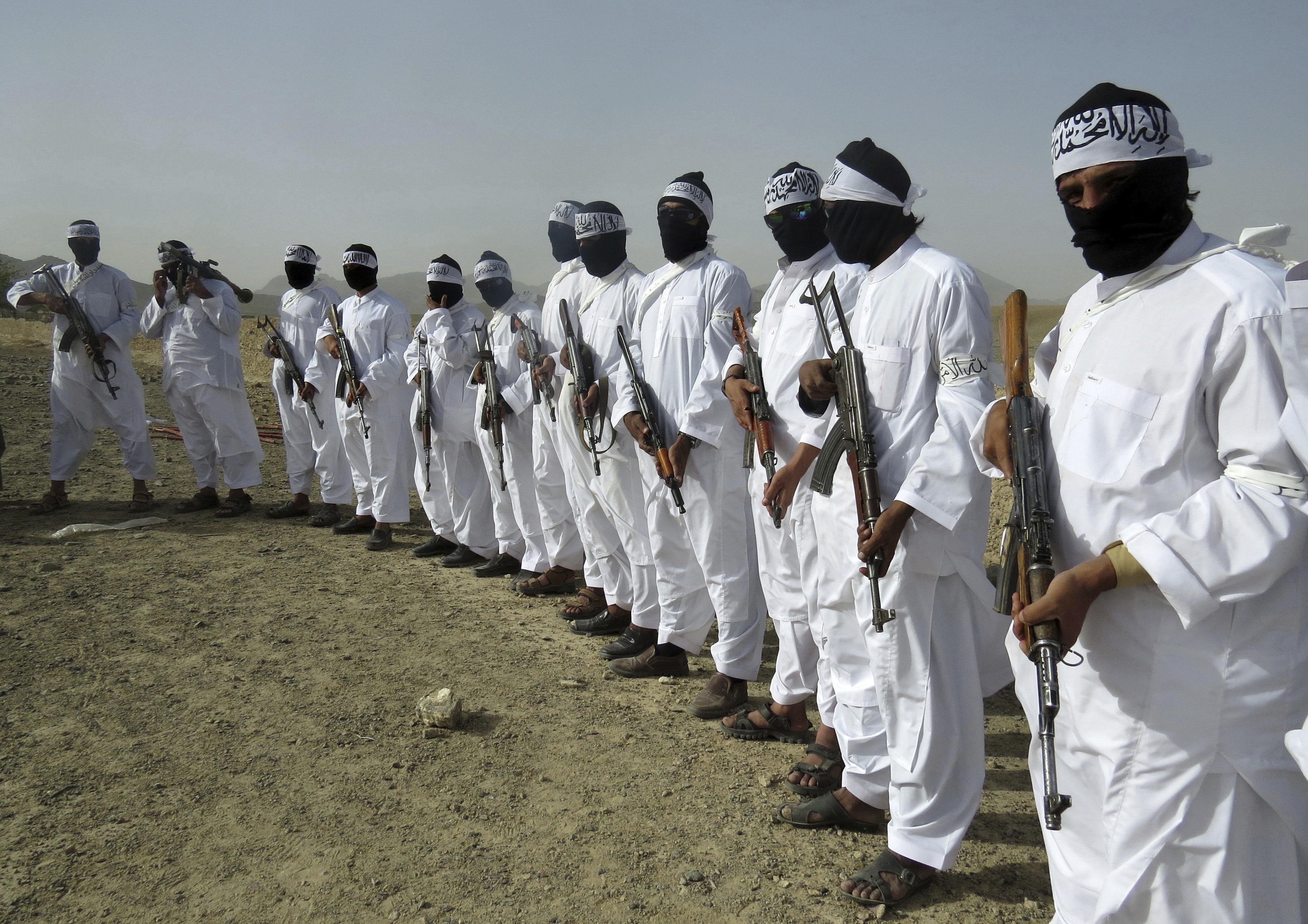 A file picture taken in August last year of Taliban suicide bombers standing guard during a gathering of a breakaway faction of the militant group in Zabul province, Afghanistan. Photo: Associated Press