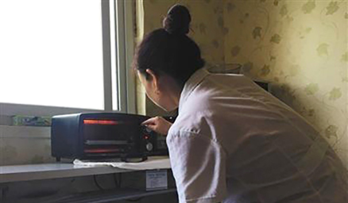 A woman processes placentas sourced illegally from hospitals. Photo: Handout