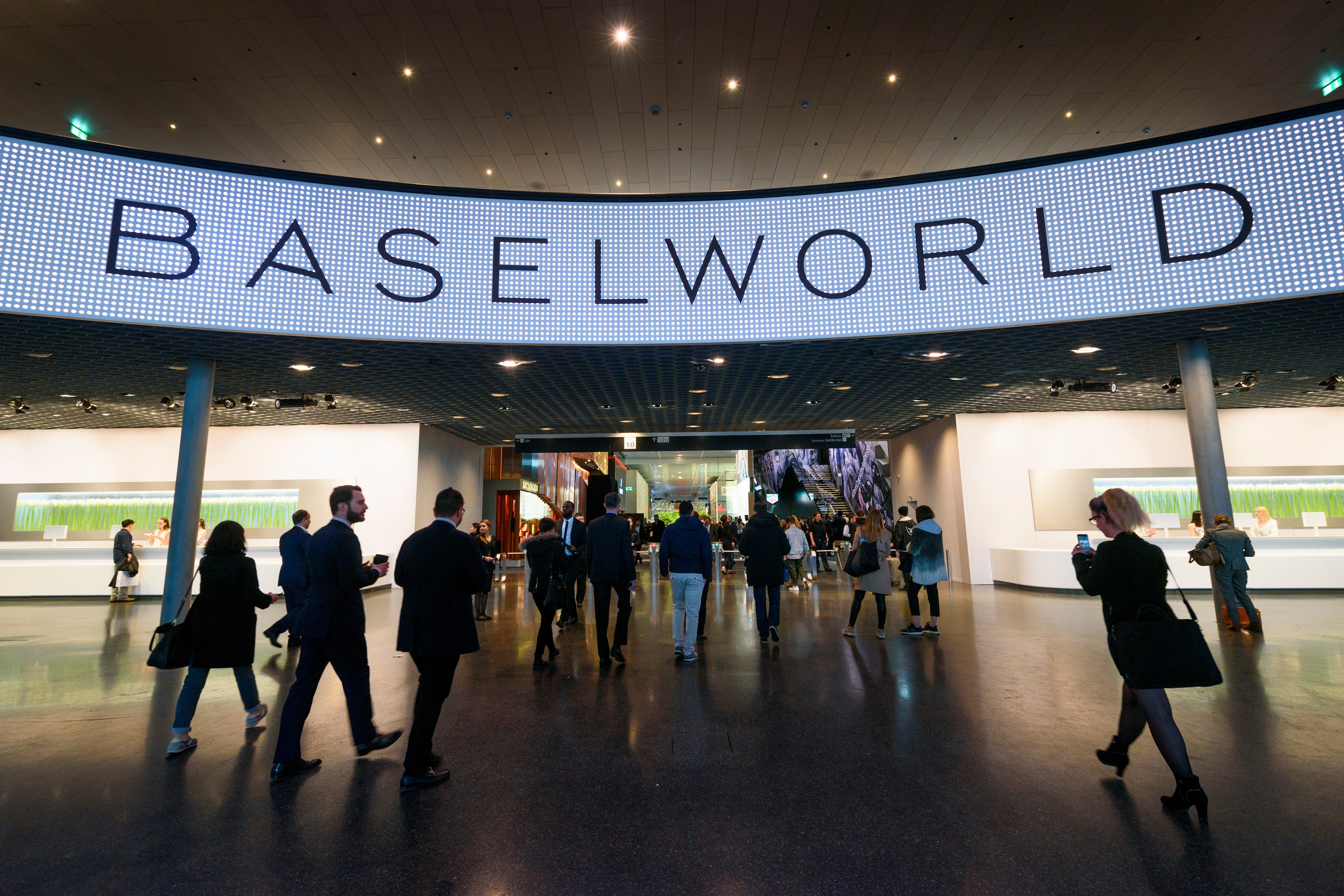 Visitors enter during the press day of Baselworld watch and jewellery show on March 22, 2017 in Basel. Photo: AFP