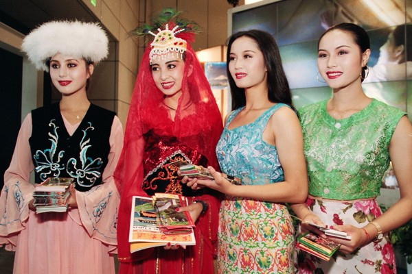Women in traditional Asian dress at an opening ceremony of the International Travel Expo in Hong Kong. Photo: SCMP