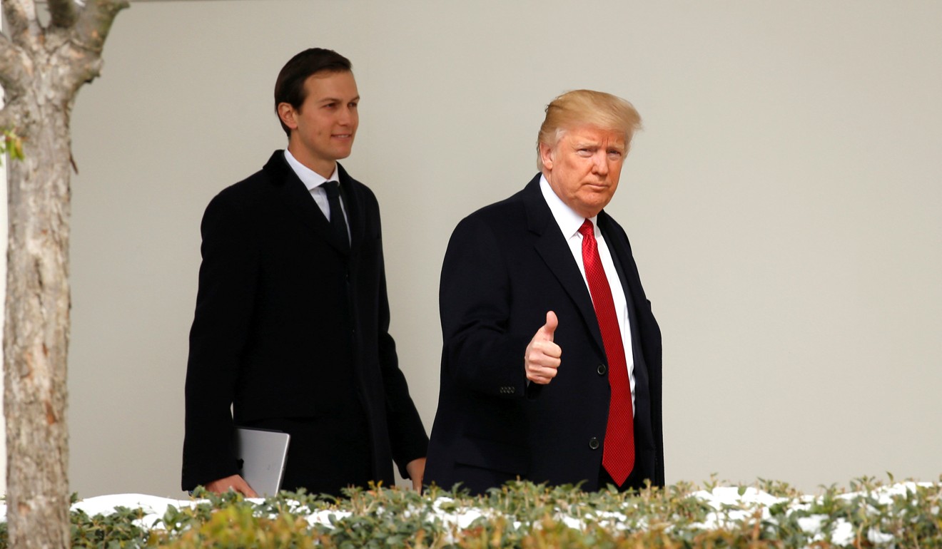 Trump gives a thumbs-up as he and Kushner leave the White House. Photo: Reuters