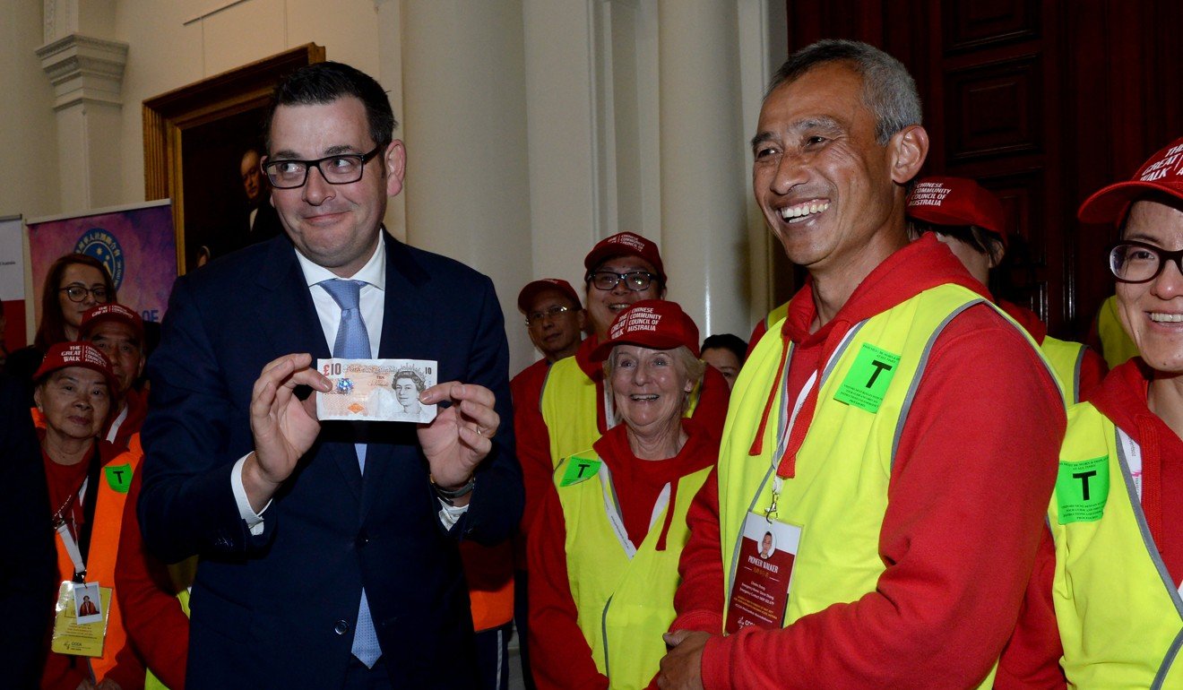 Victoria state Premier Daniel Andrews (left) at a function in Melbourne to formally apologise to descendants of Chinese migrants that were targeted by a racist ten-pound tax some 160 years ago. Photo: EPA