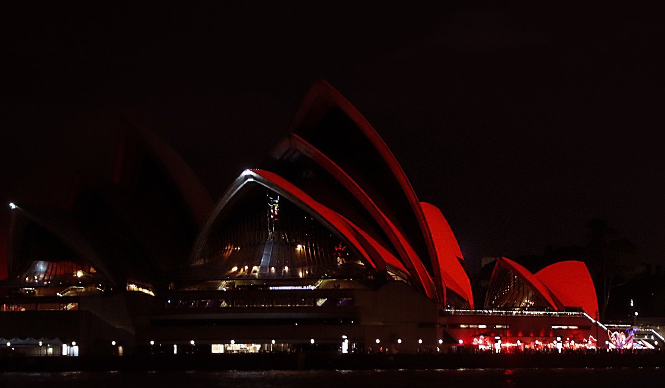 Australia's iconic Opera House is lit up in red in connection to celebrate the Lunar New Year. Photo: AFP