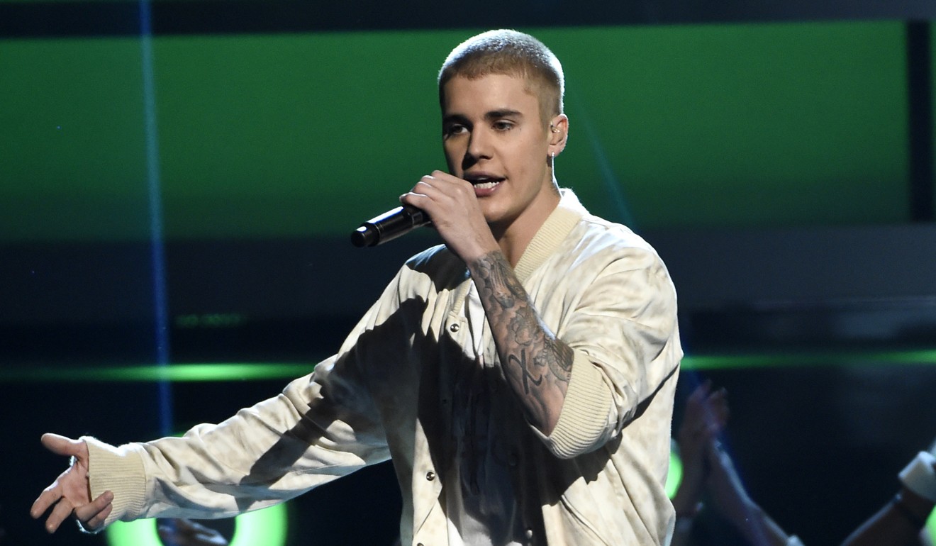 Justin Bieber performs at the Billboard Music Awards in Las Vegas. Bieber will join Ariana Grande at a charity concert called 