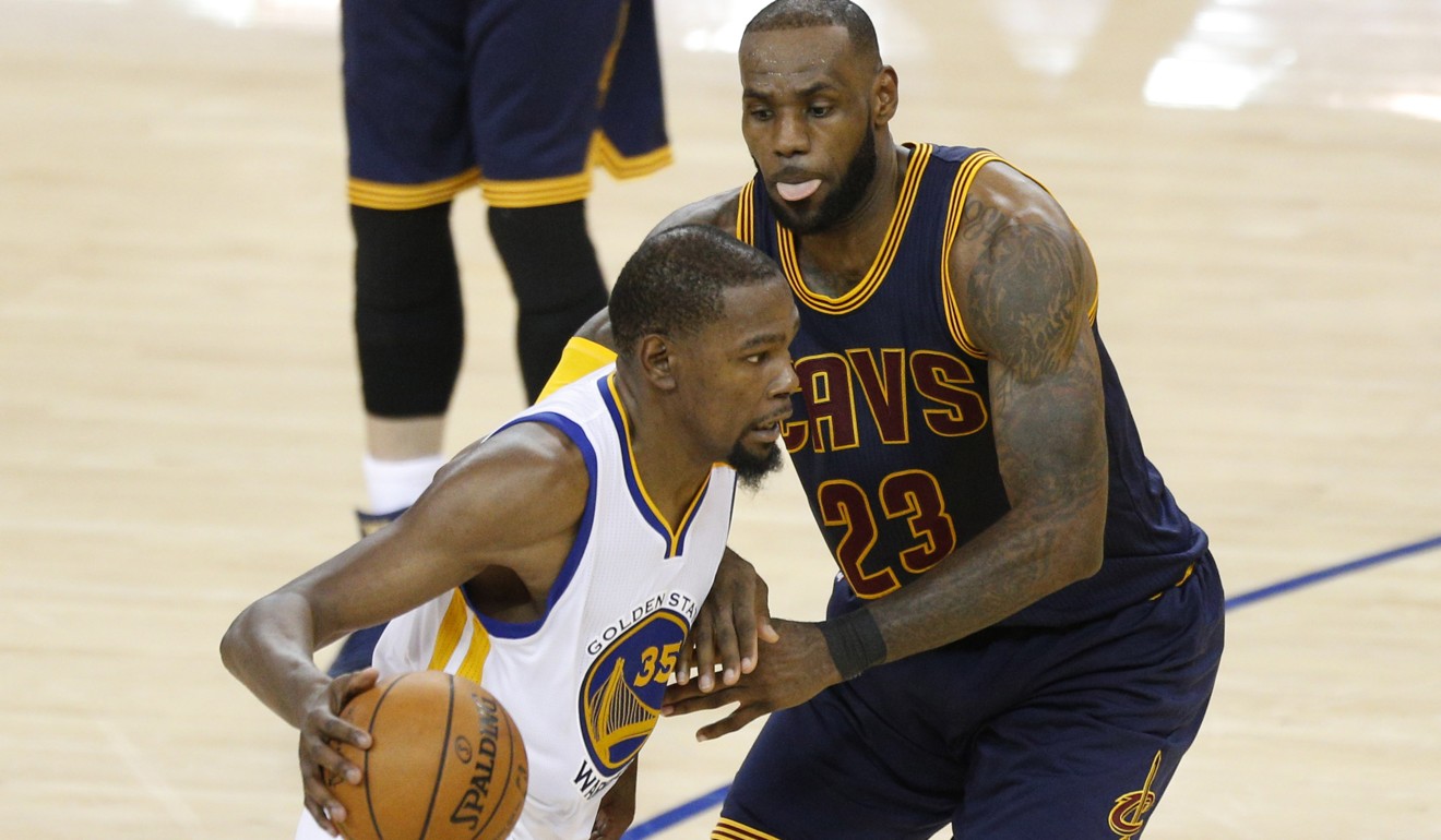 Golden State’s Kevin Durant dribbles past Cleveland star LeBron James in the opening game of the NBA Finals. Photo: USA Today Sports