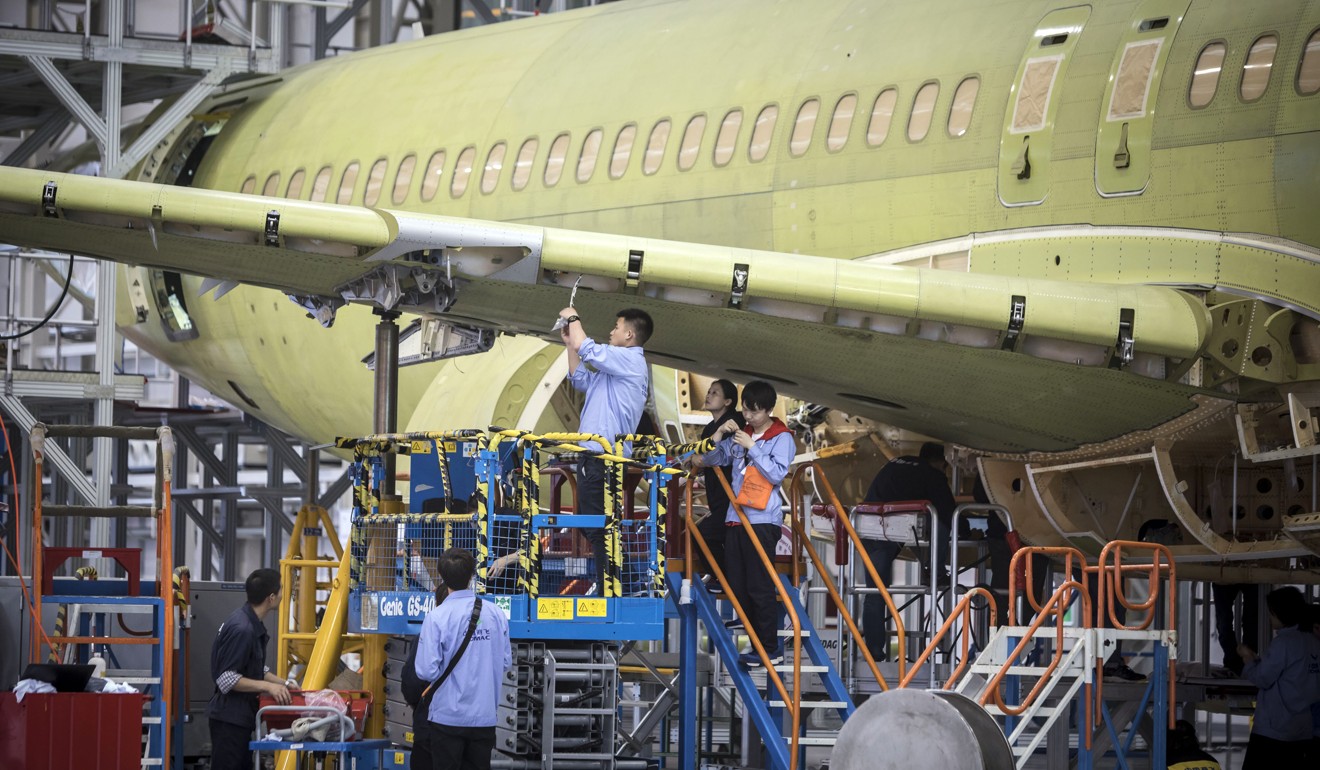 The successful maiden flight of self-built C919 jet signified an important milestone in the Shanghai government’s plan to refocus on the manufacturing sector. Photo: Bloomberg