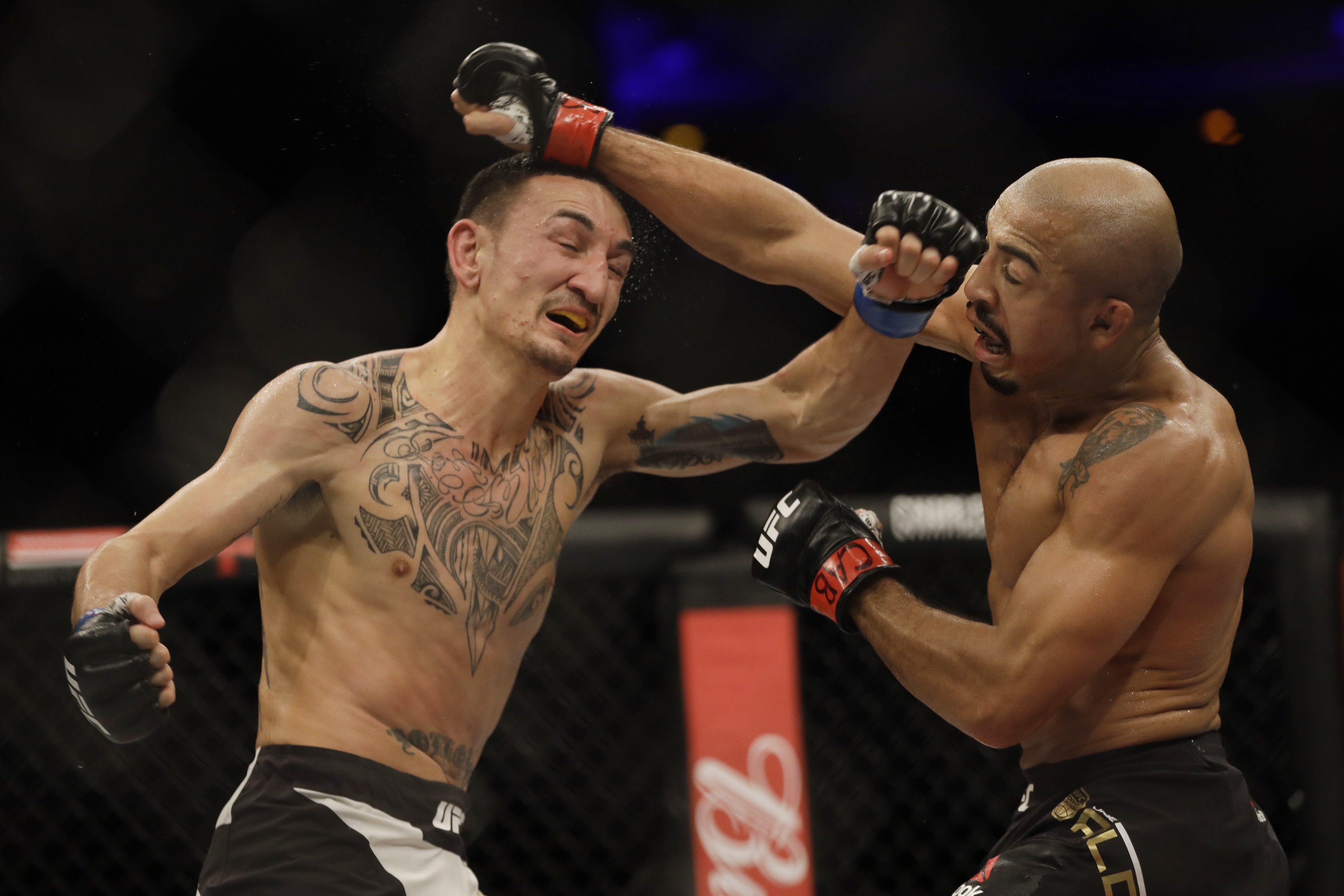 kage praktiserende læge ventilator Max Holloway stops Jose Aldo in third round to win UFC featherweight belt |  South China Morning Post