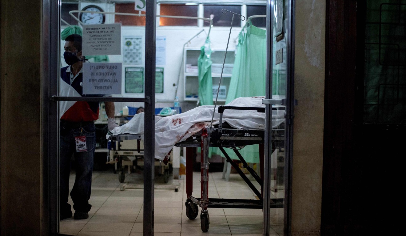 The body of one of a suspected Maute member killed in an ambush. Photo: AFP