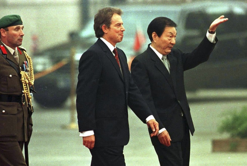 British Prime Minister Tony Blair (centre) with Chinese Premier Zhu Rongji, in Beijing, in 1998. Picture: AP