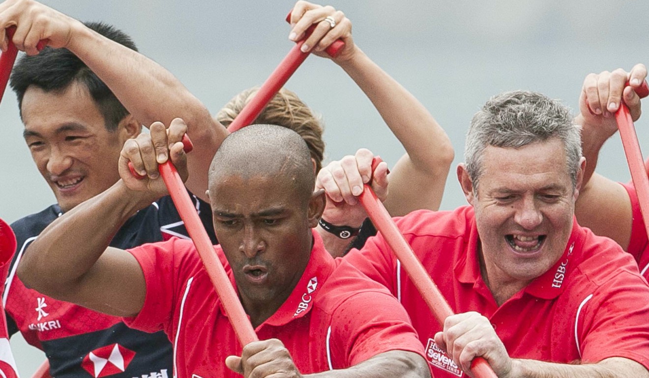 Former British & Irish Lions’ star Gavin Hastings (right) dragon boating in Hong Kong with Salom Yiu (left) and George Gregan. Photo: SCMP Pictures