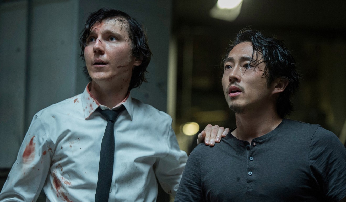 Paul Dano and Steven Yeun in a still from Okja.